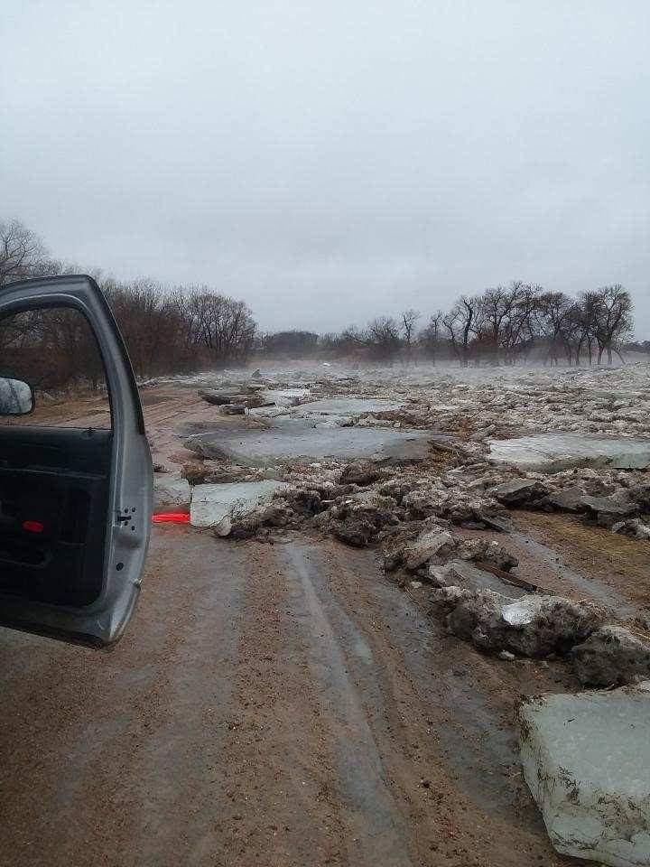 Ice chunks carried from flood waters onto the Road near Elba,NE r/pics