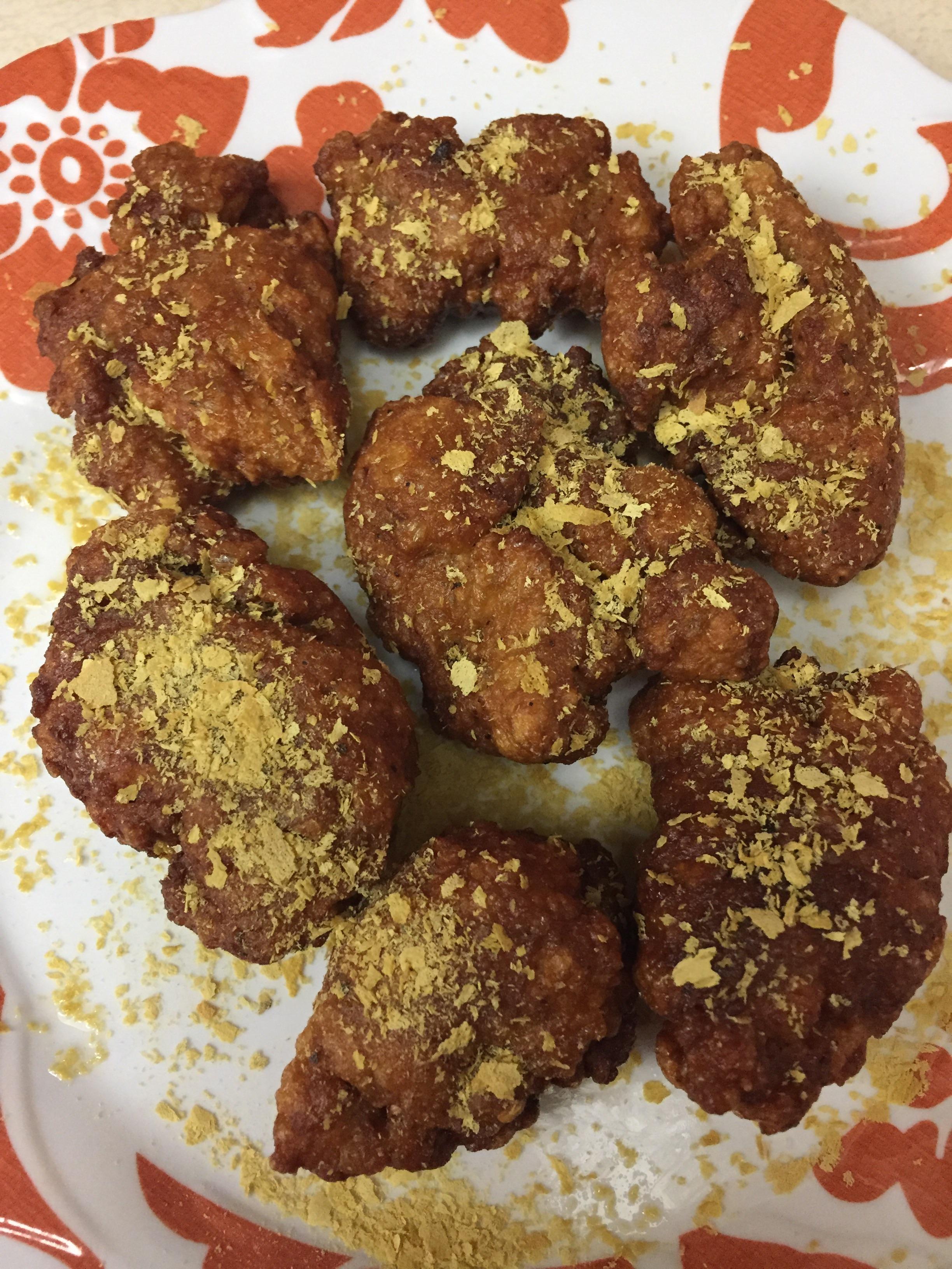 Deep fried homemade seitan with a dash of nutritional yeast on top. All