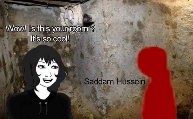 Who is Saddam Hussein, why is he red, why is his room like that and why