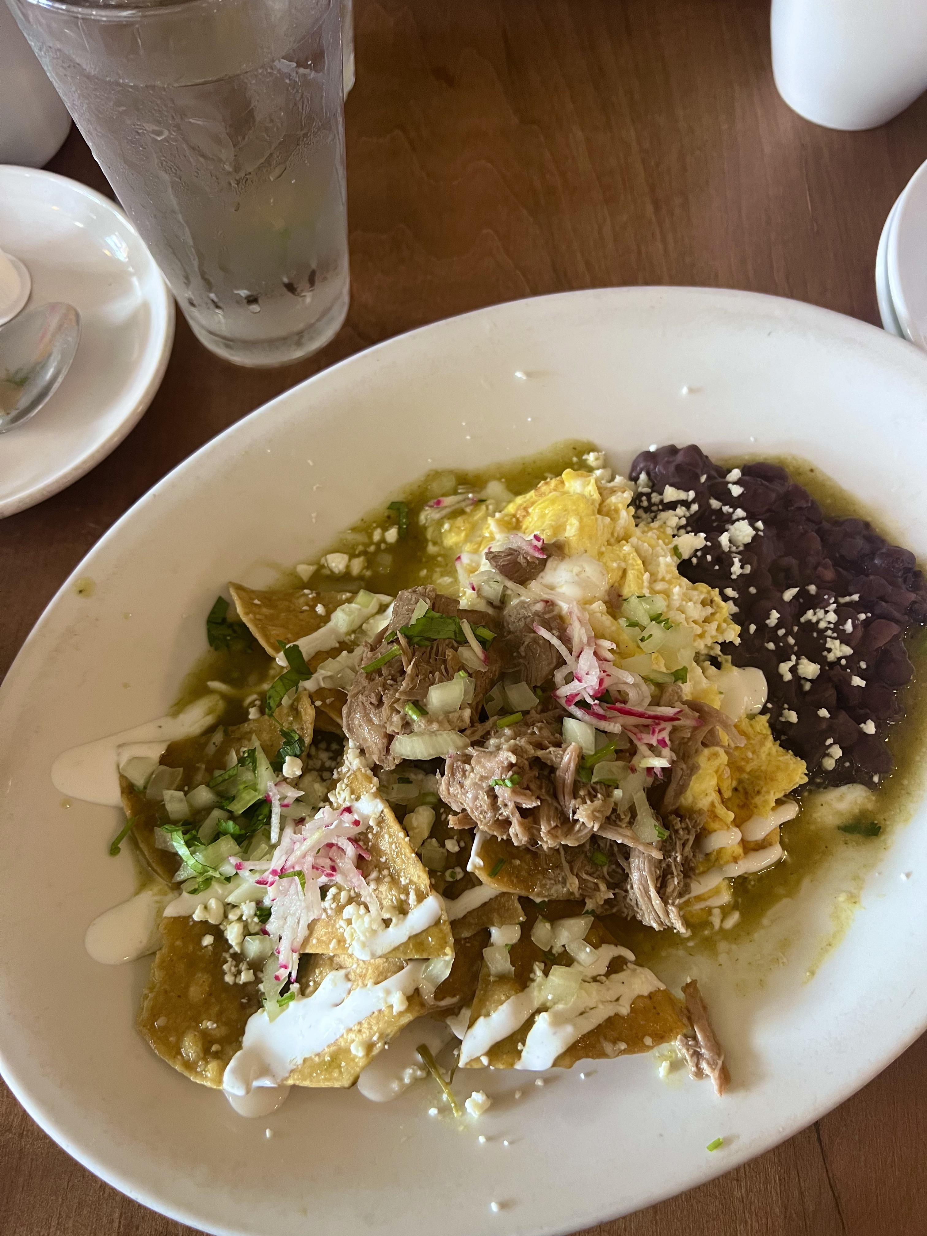 Carnitas chilaquiles at 5 Rabanitos in Pilsen. Each bite was perfection