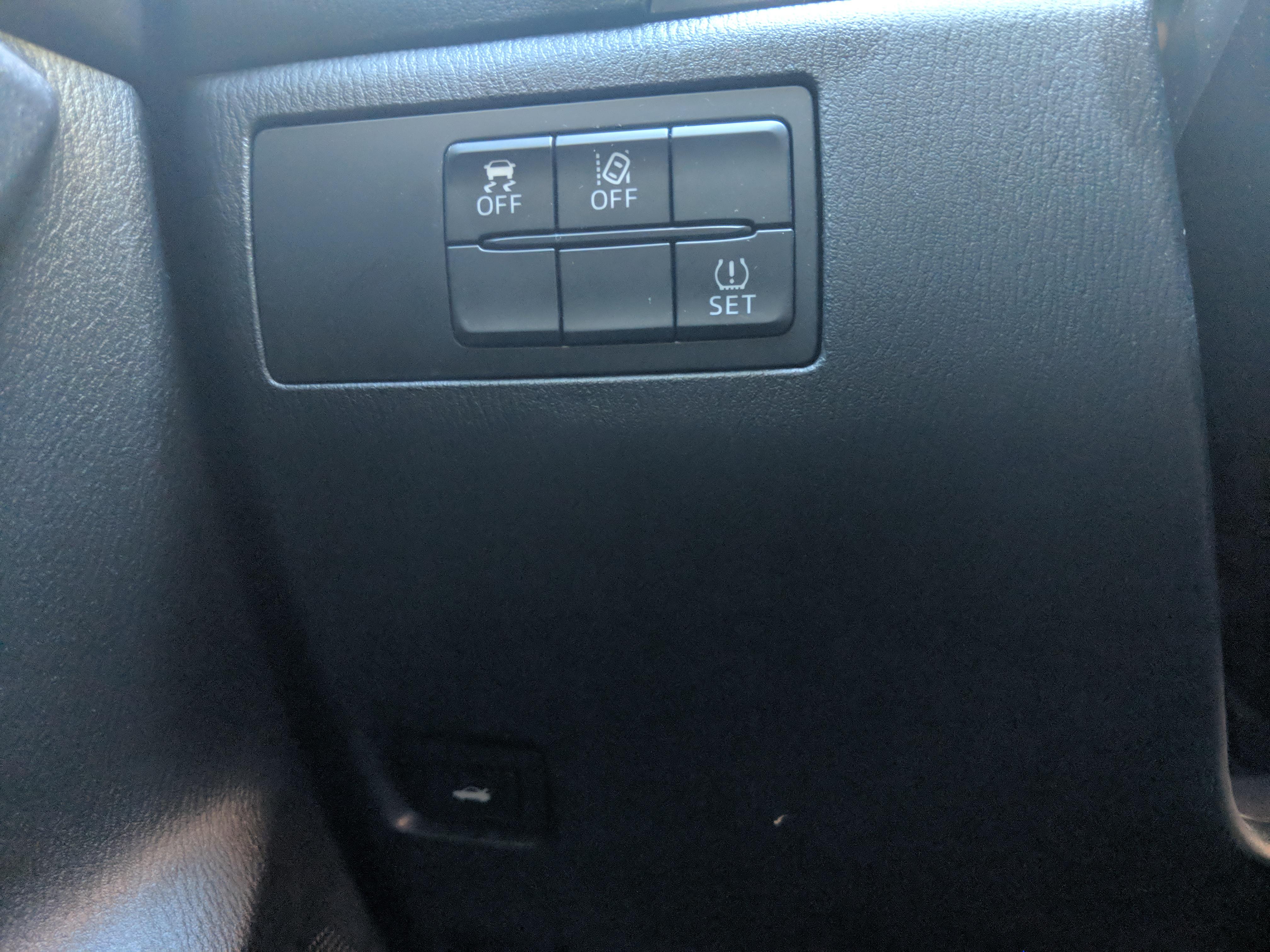 Anyone know how to open and use the other buttons? IDK what its called, for Mazda 3 2018 r/mazda