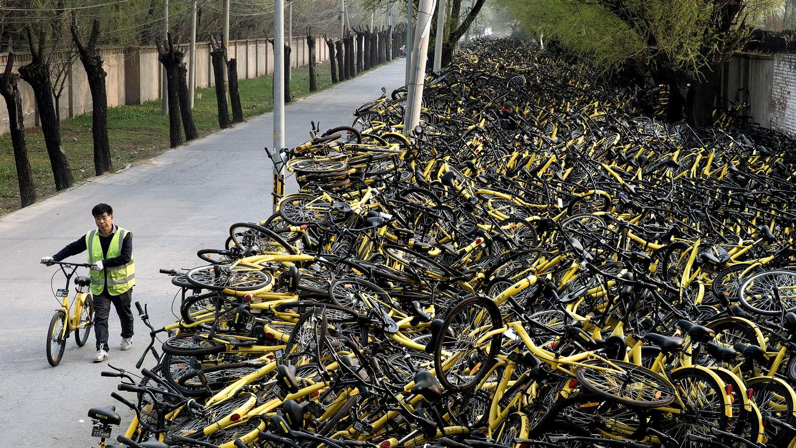 Dump of broken bicycles in Beijing r/pics