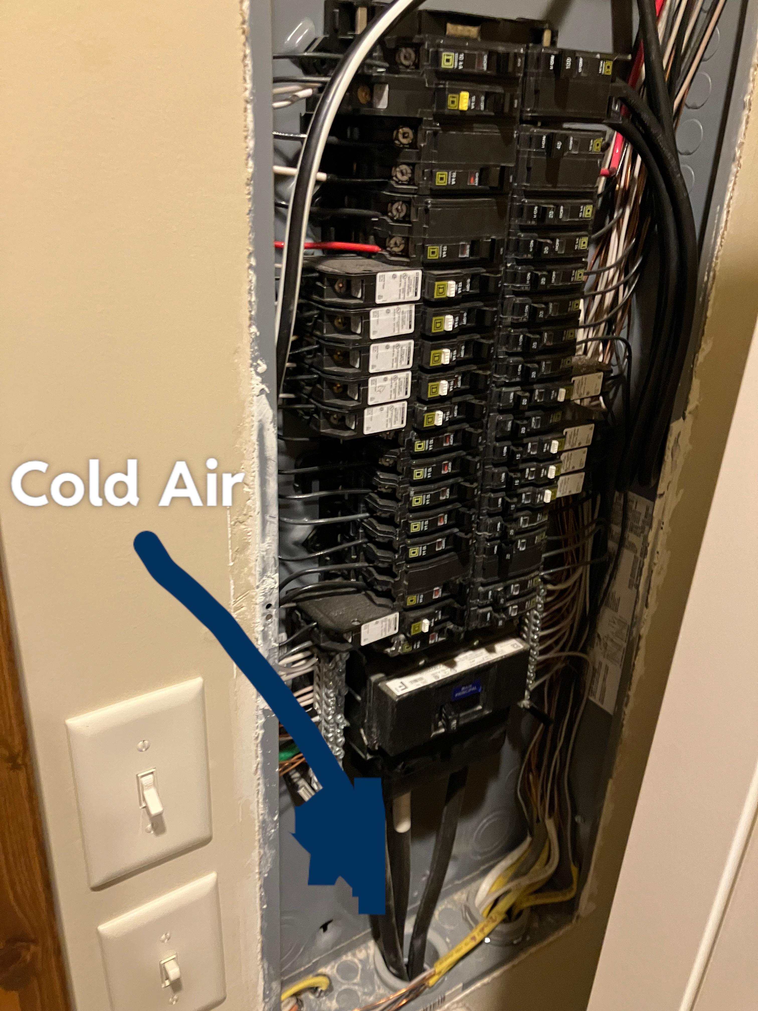 Cold air coming from main electric conduit. Ok to insulate or spray