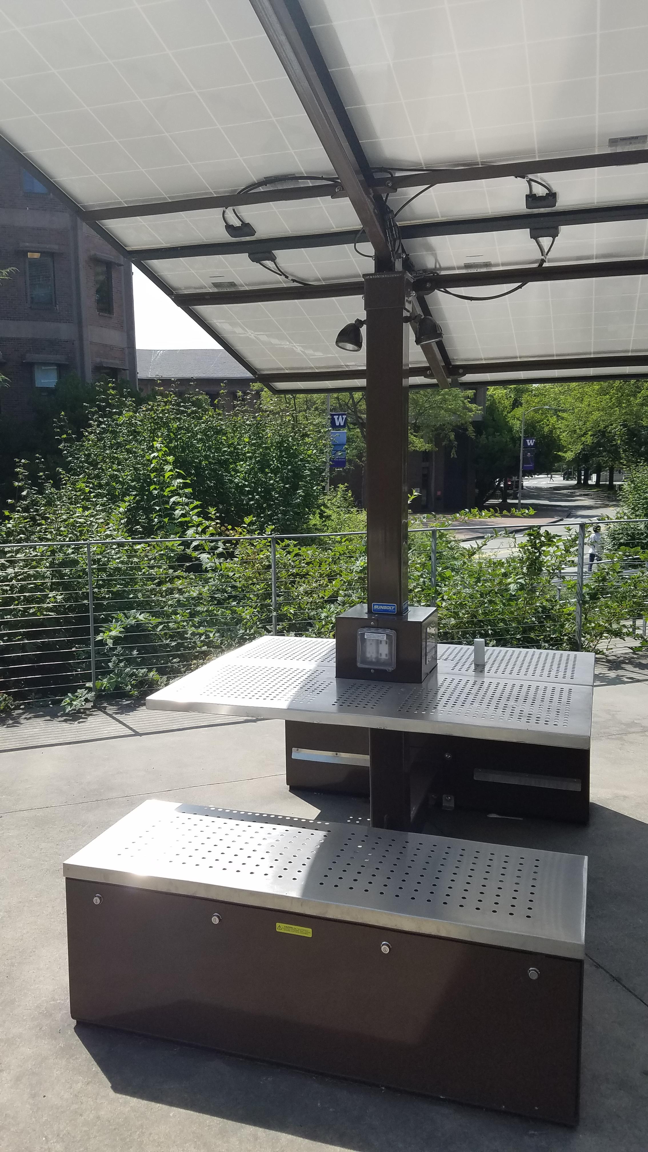 This table at my university uses solar power to power a