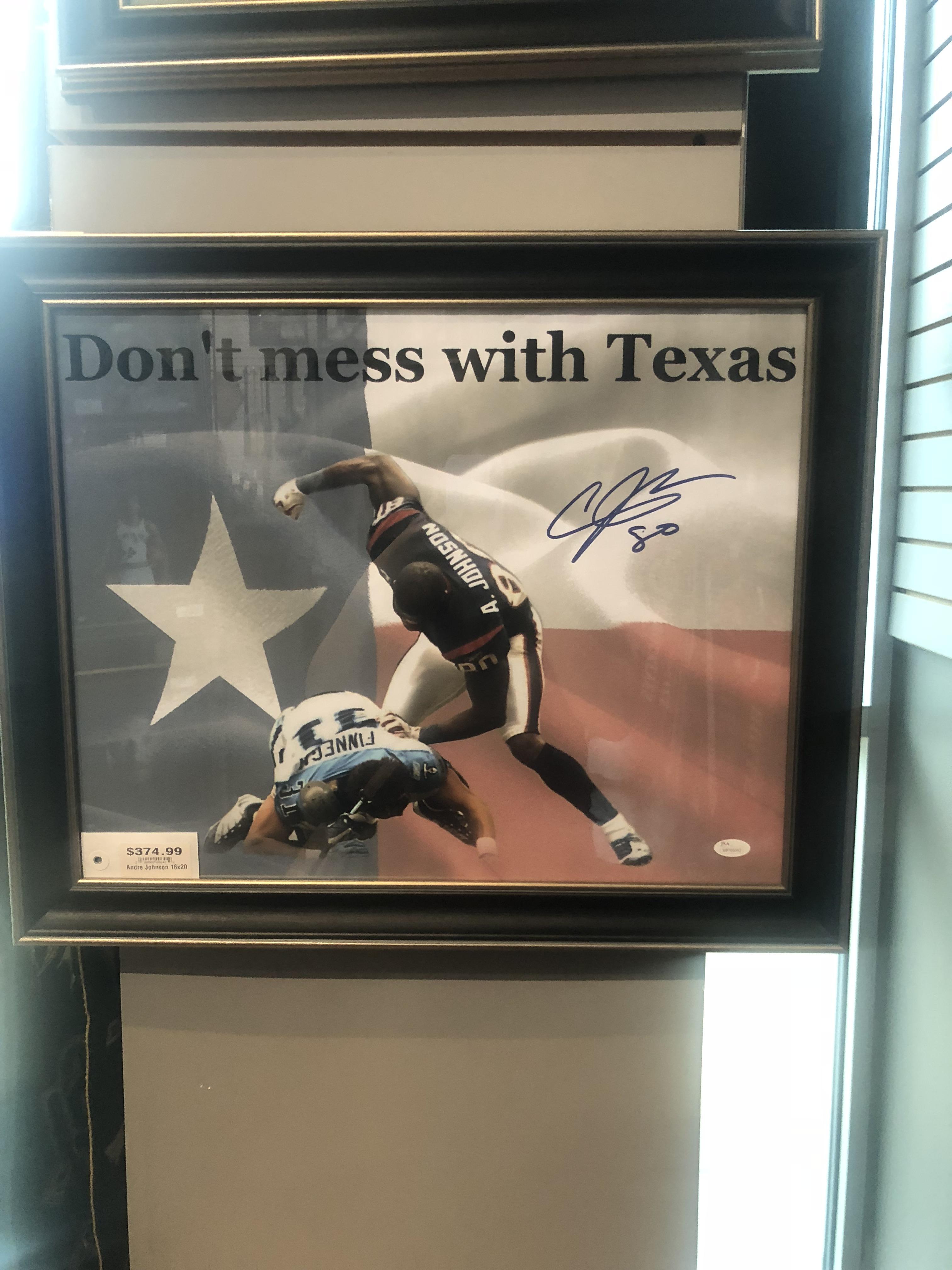 A great Texans moment immortalized at the sports memorabilia shop. r