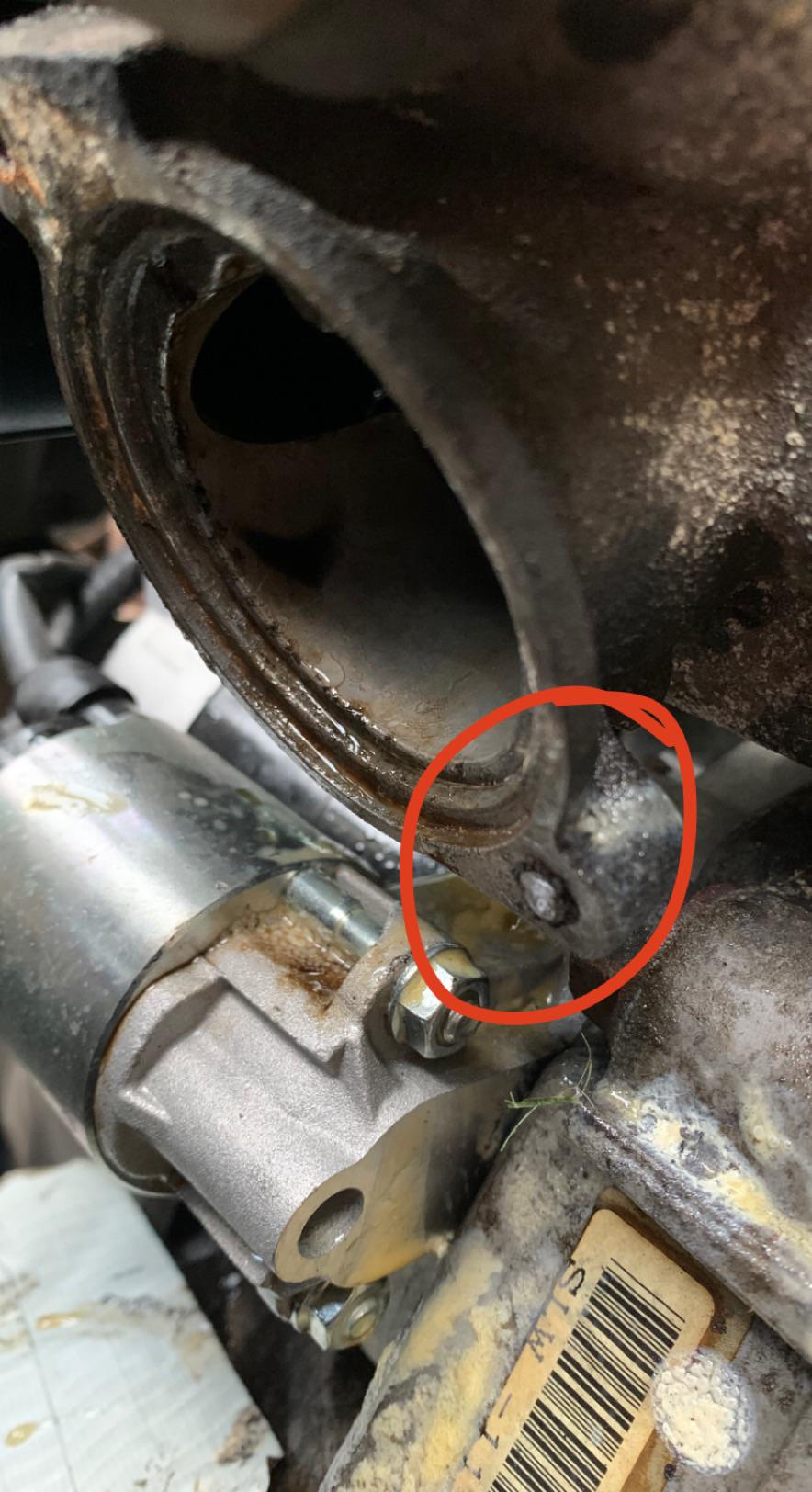 How do I remove this snapped bolt on my thermostat housing? The