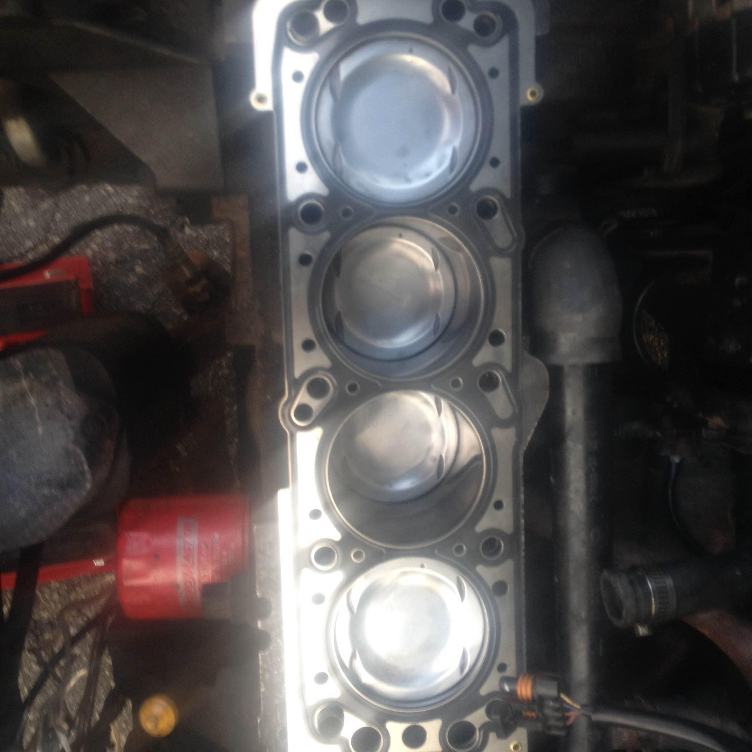 Pistons cleaned after my gf's car blew a head gasket. r