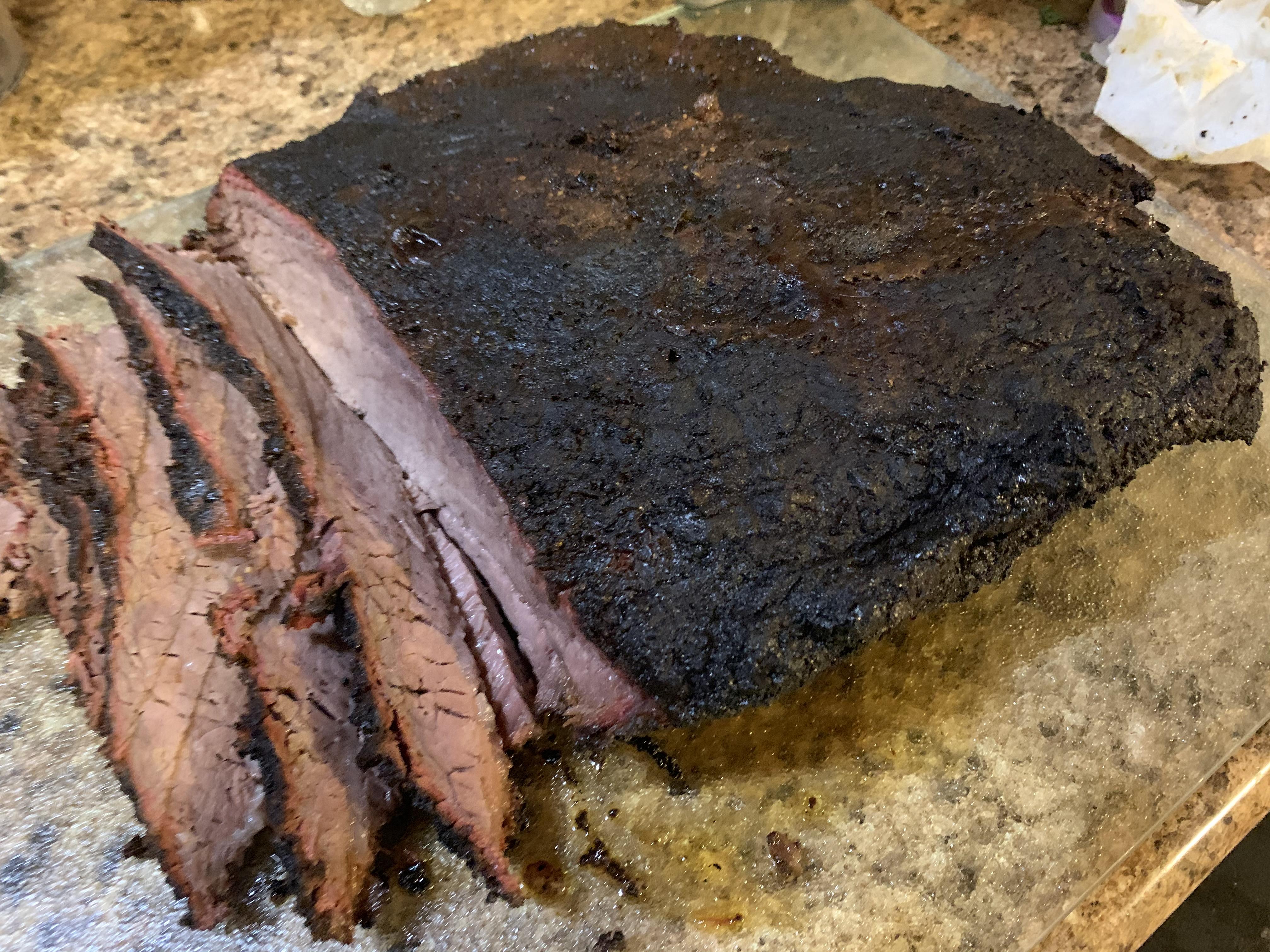 First smoked brisket....8.5lbs at 250 degrees for 8 hours (wrapped for