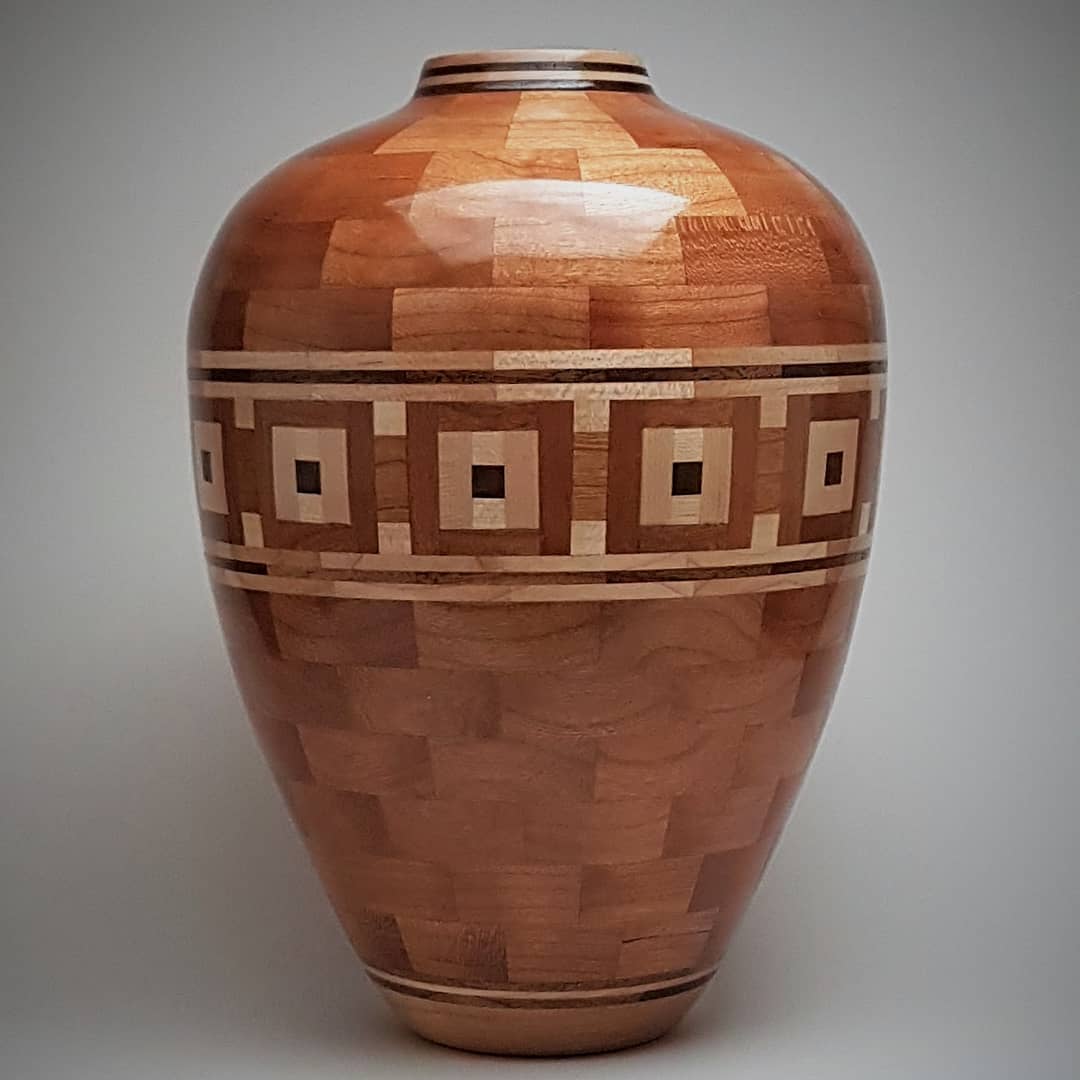 Cherry vase. 6 inches by 9 inches tall. maple and walnut accents. r