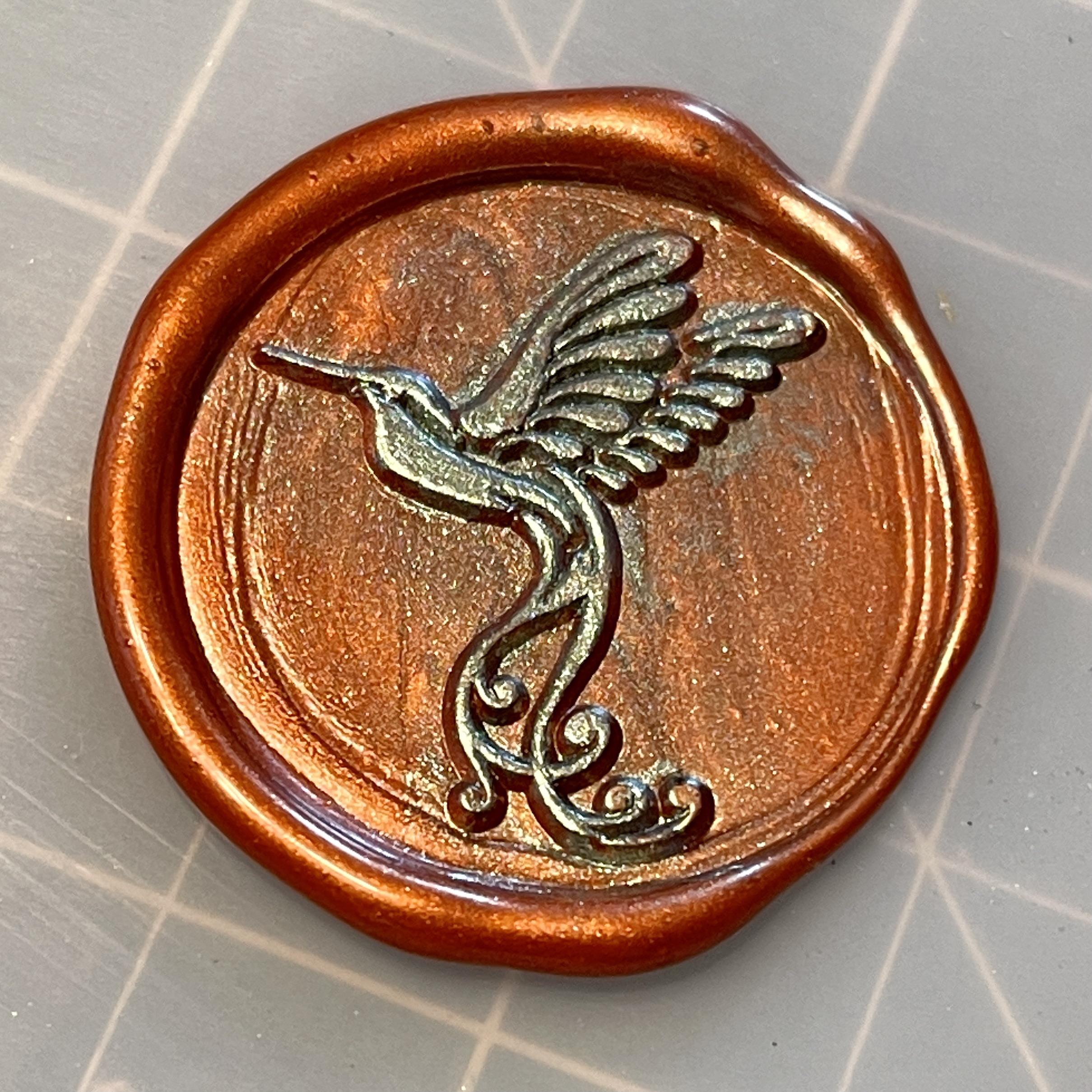 Tried another experiment. Wax seal with guilding adhesive and mica