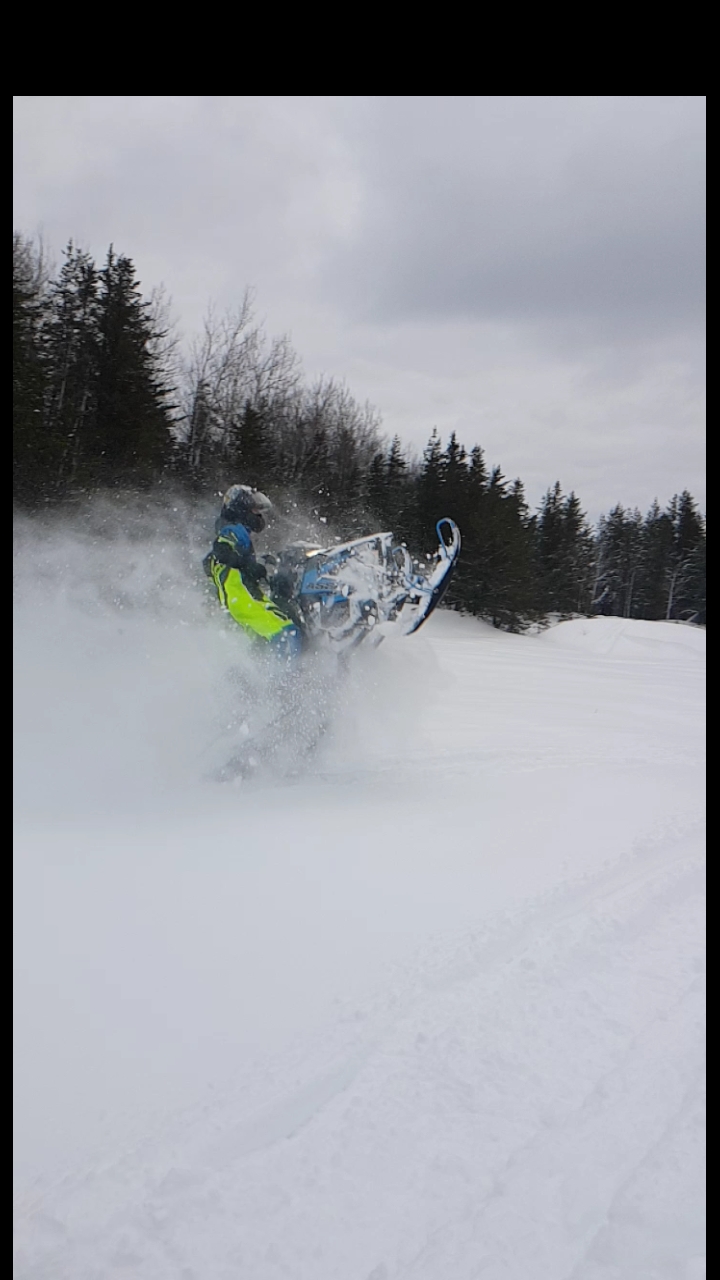 What do you think of my riding gear and snowmobile? Green and blue FXR