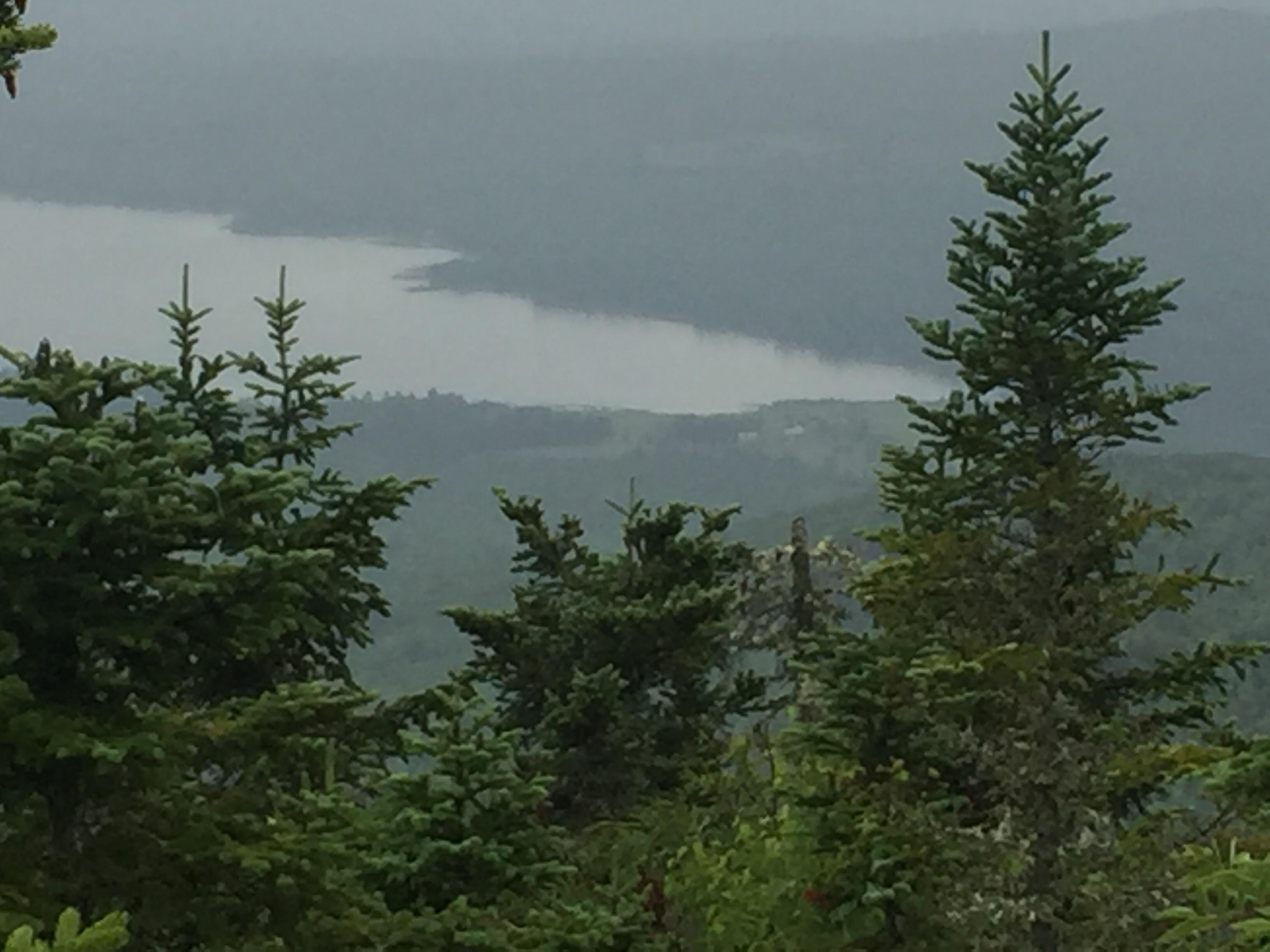 b Lake through the clouds and rain from Blueberry Mountain near Weld