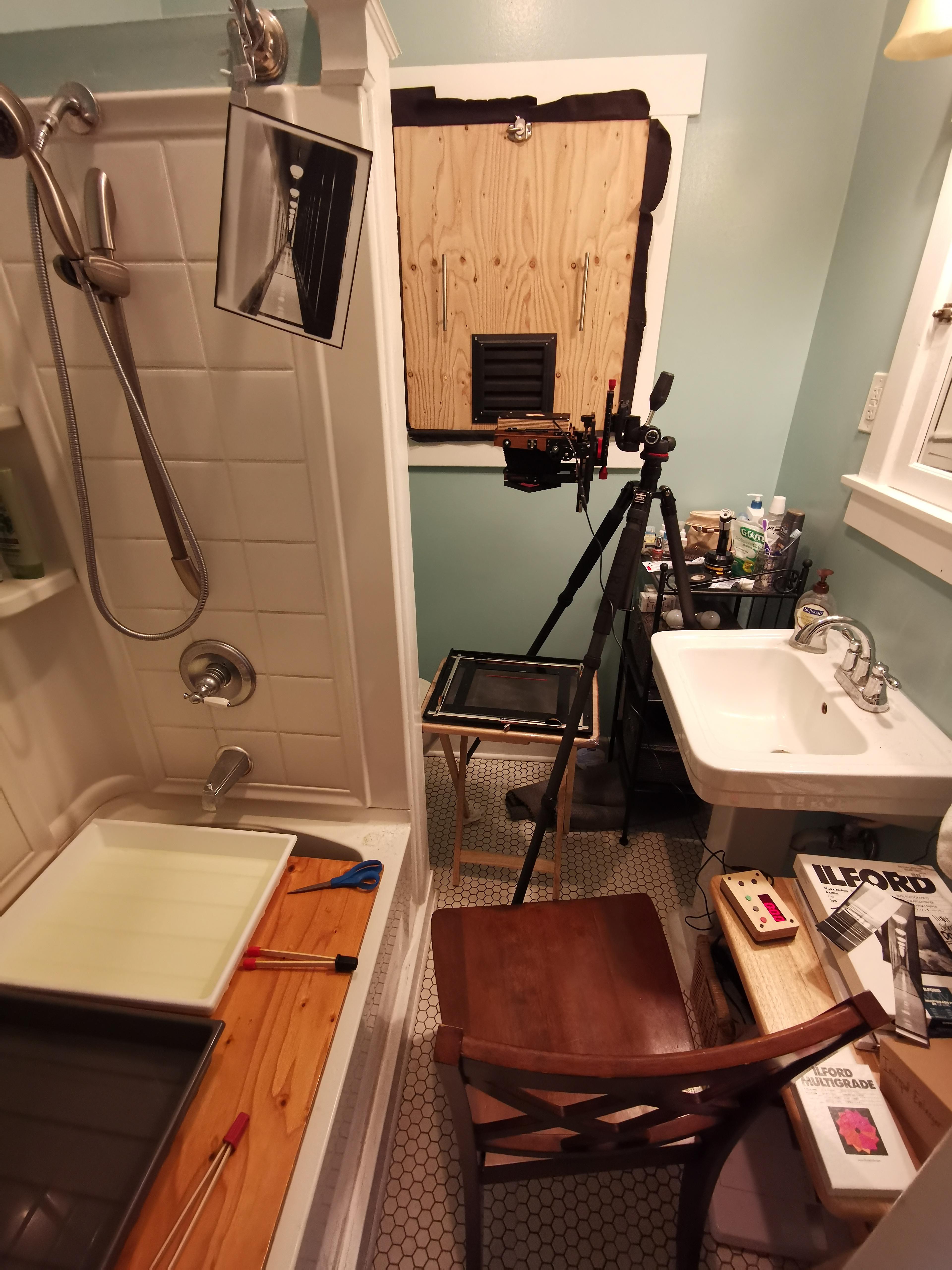 It's cramped but it works! My bathroom darkroom using a large format