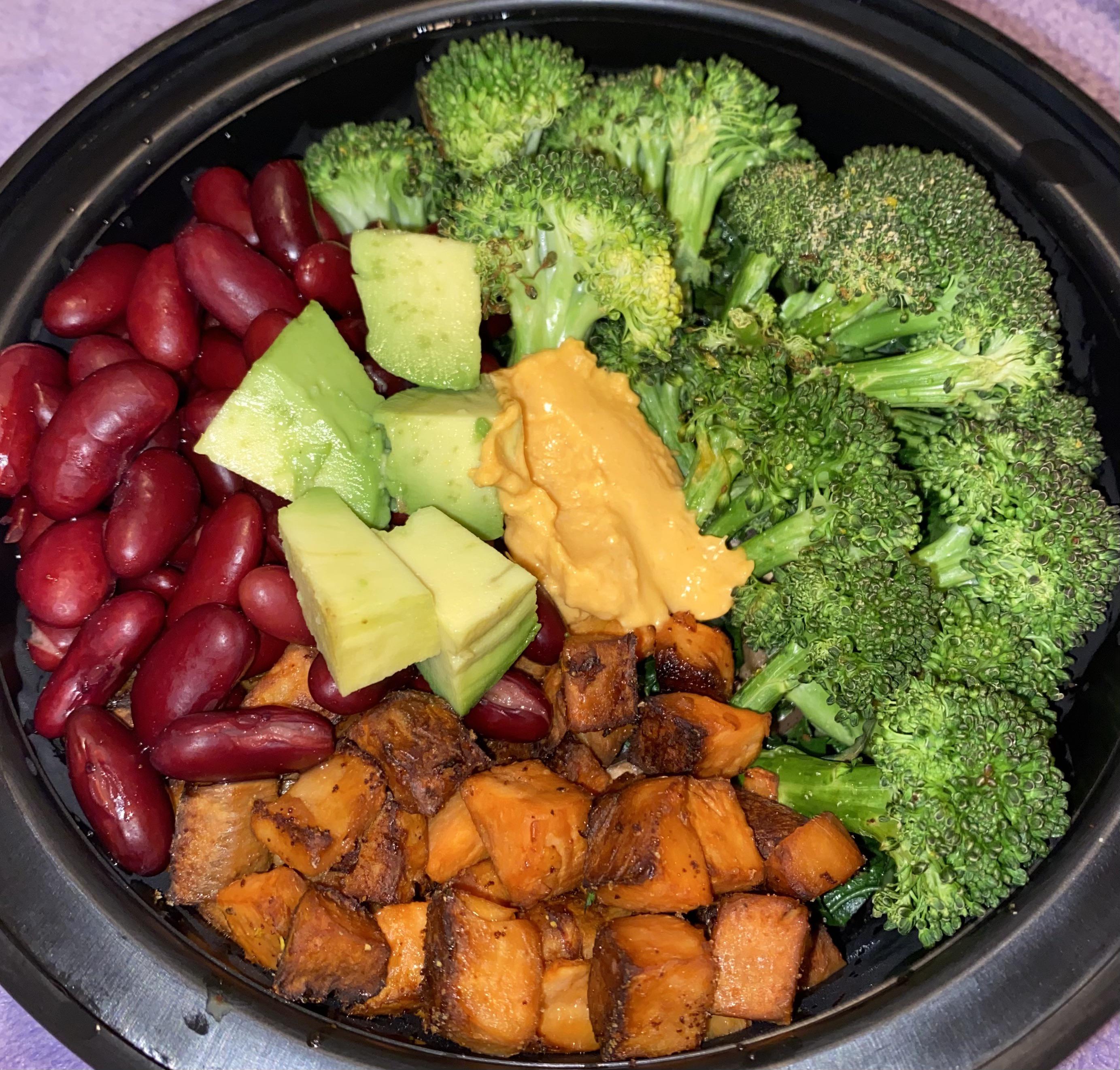 kidney beans, sweet potatoes, + broccoli on a bed of kale and mushrooms