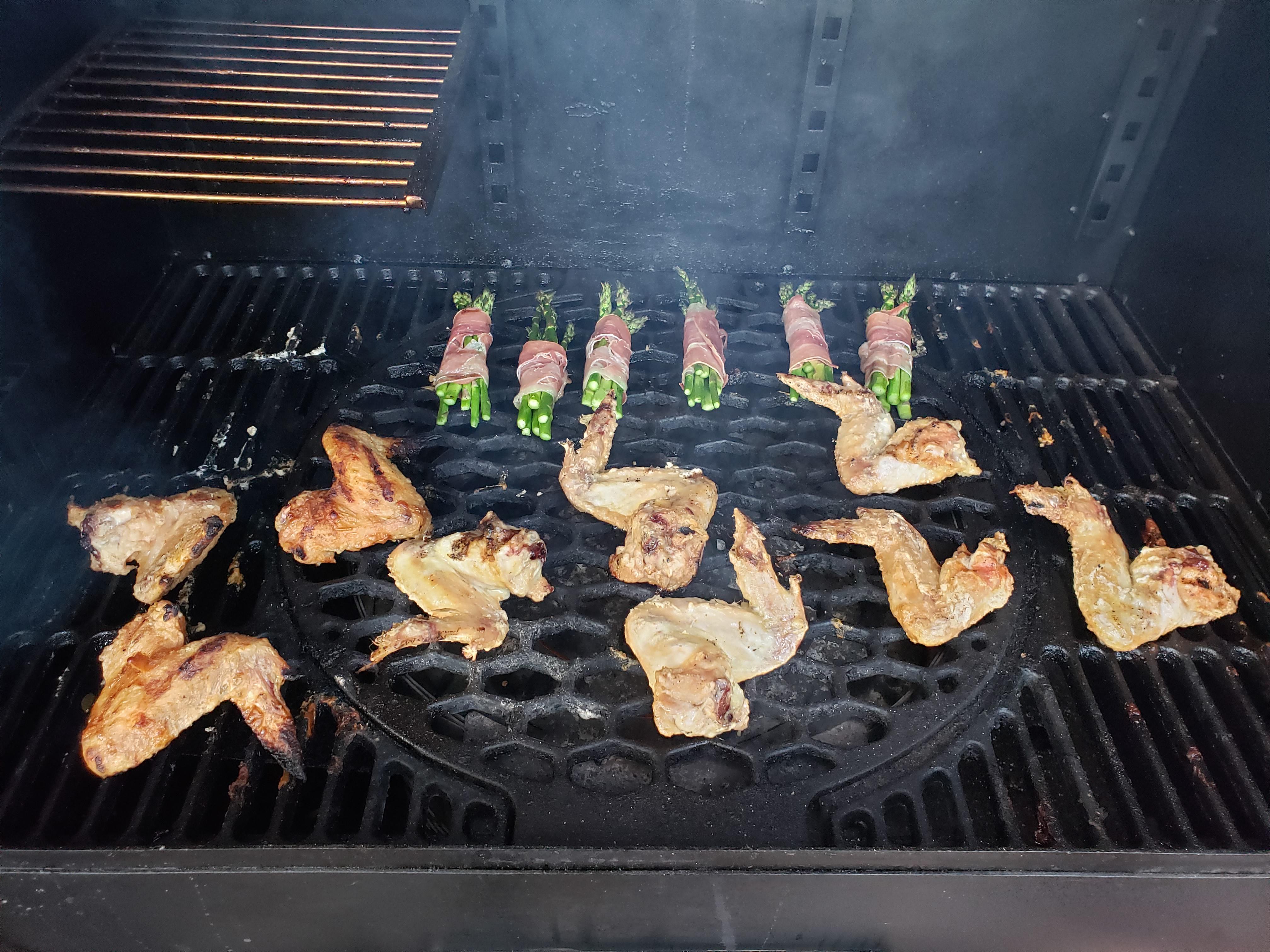 Wings and asparagus bombs on the Oklahoma Joe Rider DLX. r/pelletgrills