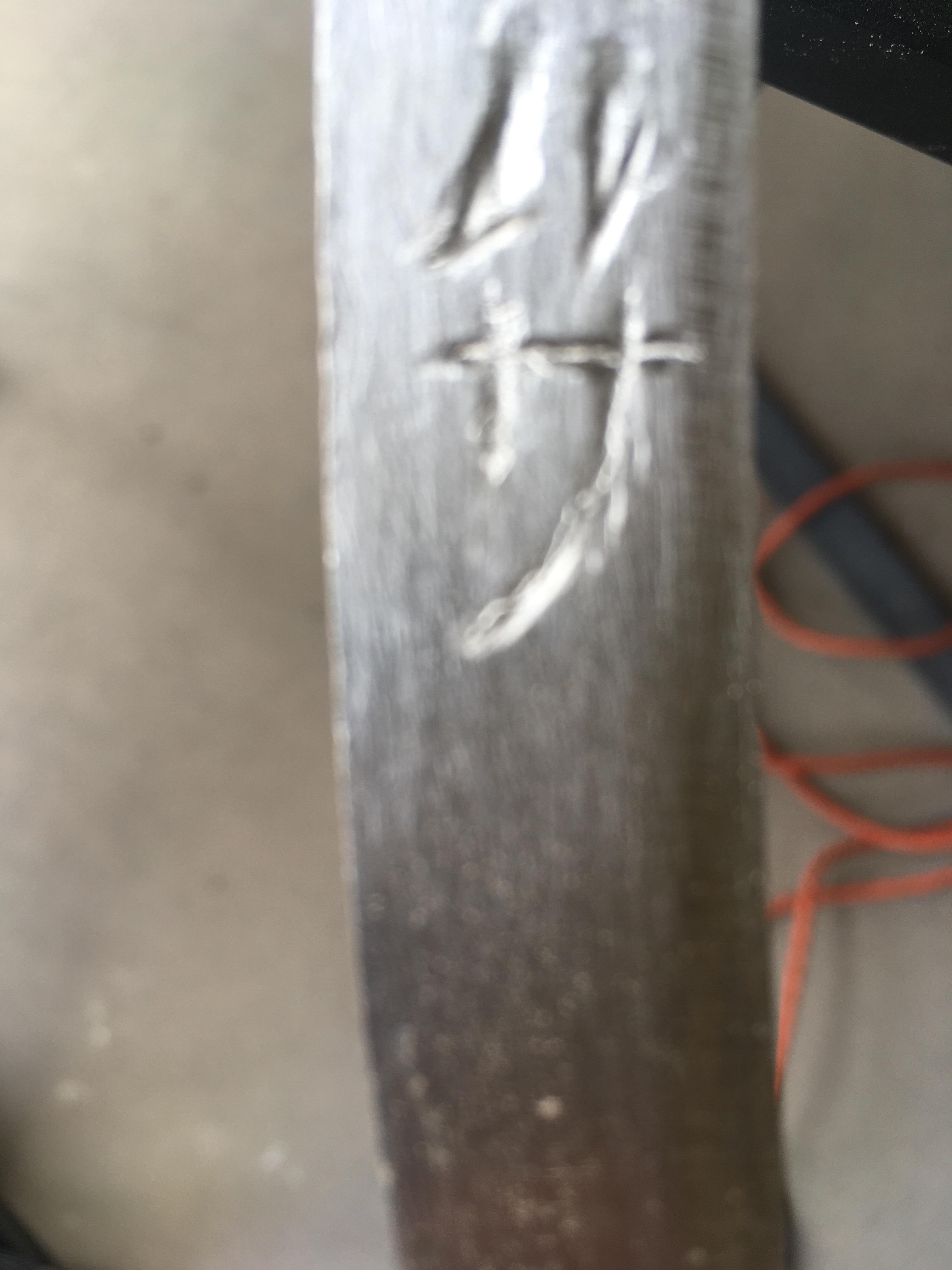 How to I clean up this steel engraving (engraved with rotary tool)? r