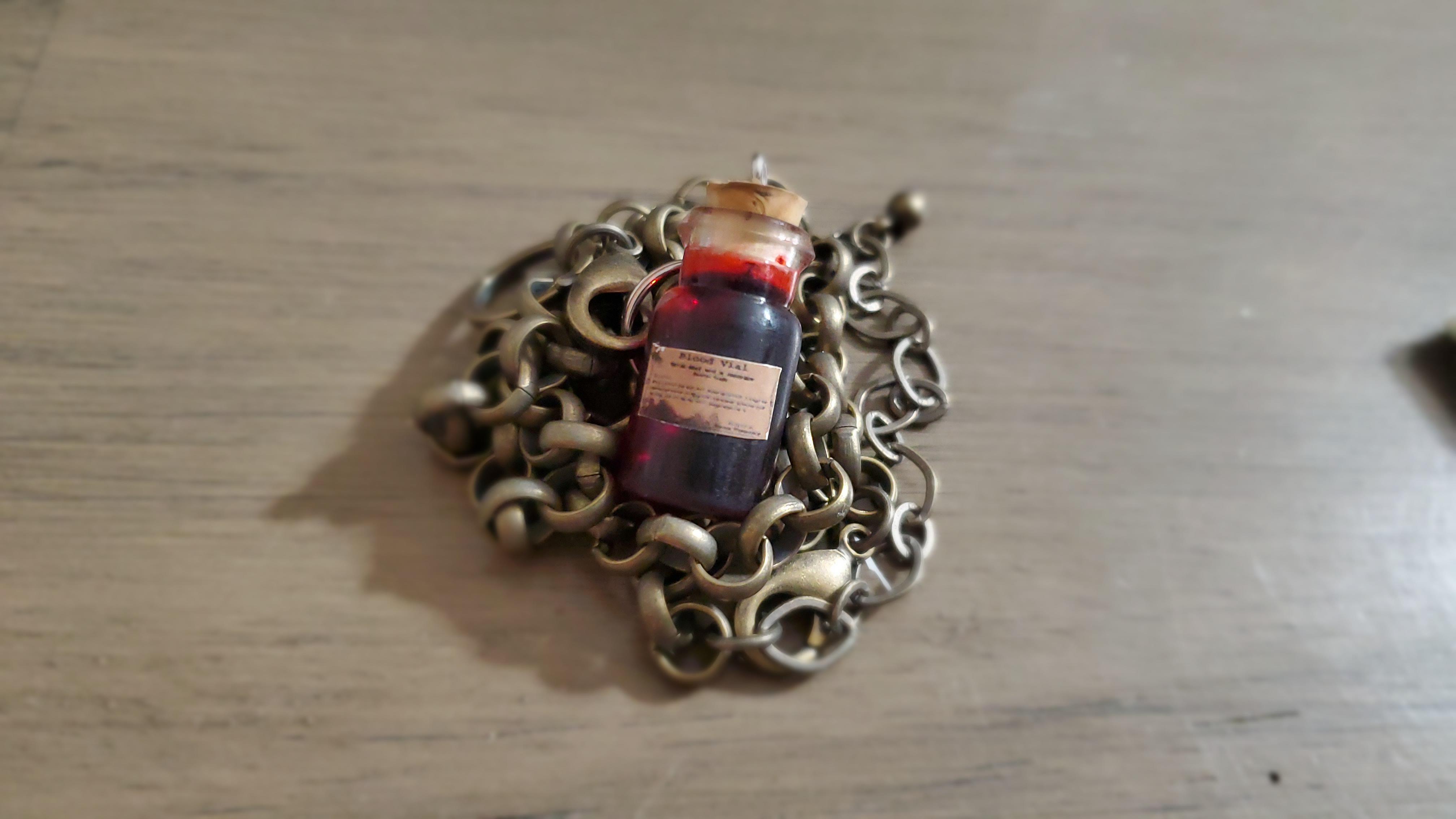 A blood vial necklace r/bloodborne