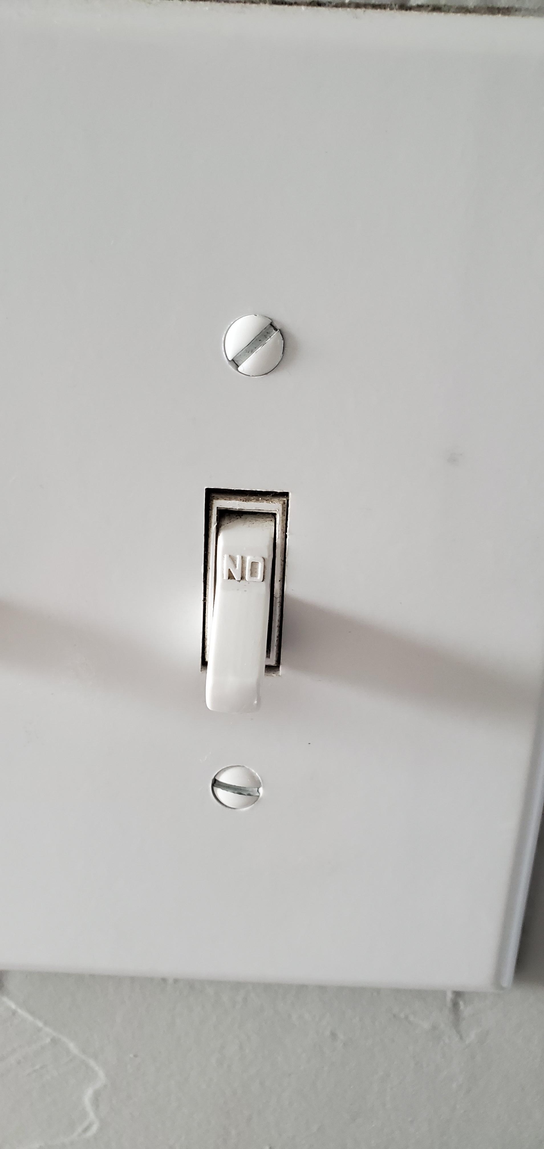 This upside down light switch in my house. r/mildlyinteresting