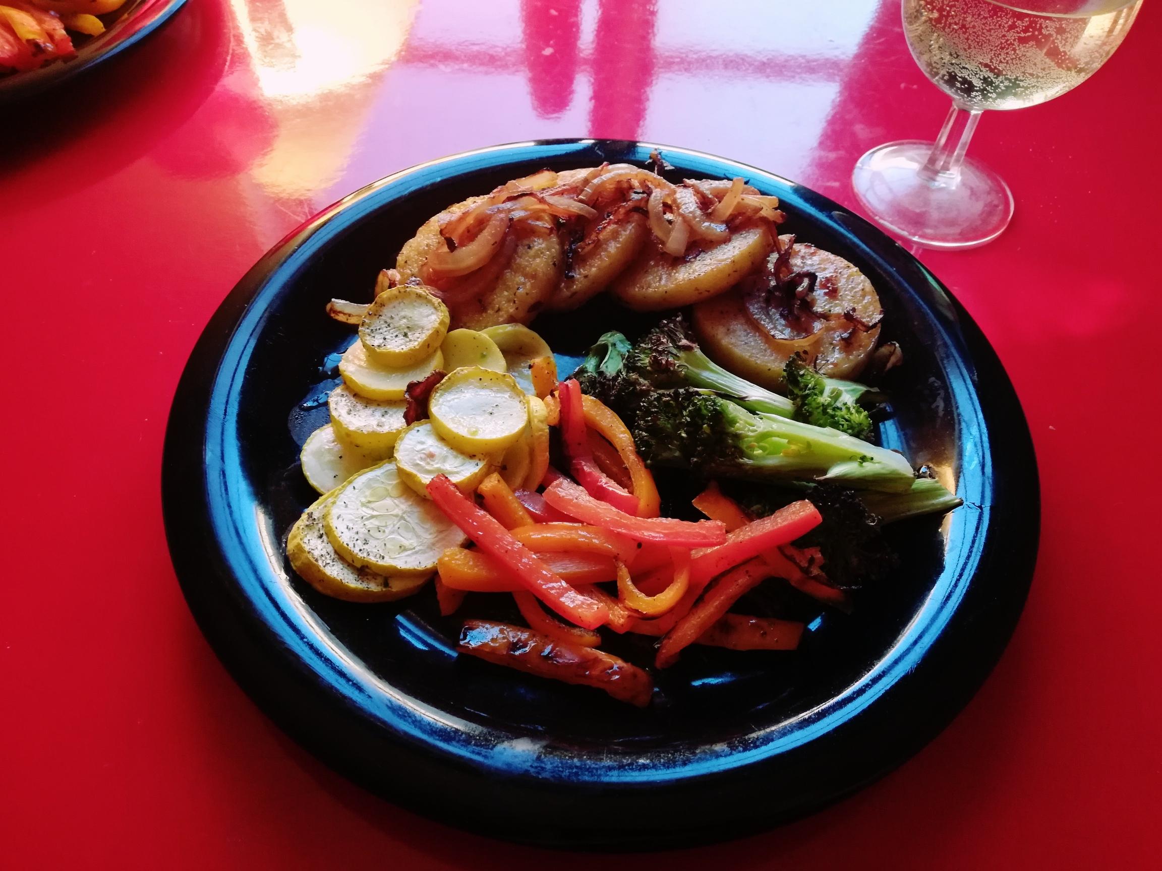 Pan fried polenta, white wine lemon reduction and roasted veggies. r