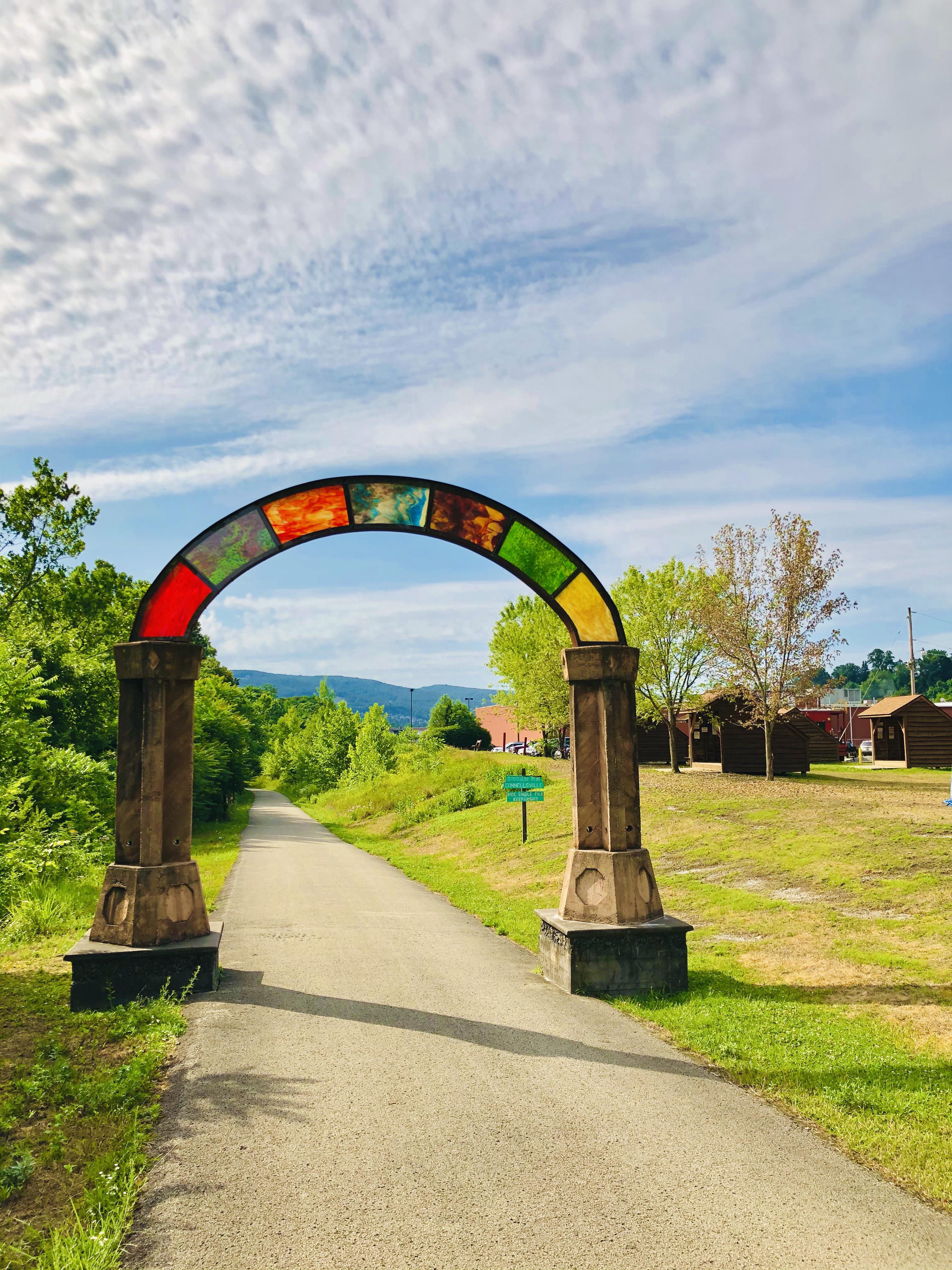 The arch leading into Connellsville next to the Adirondack shelters