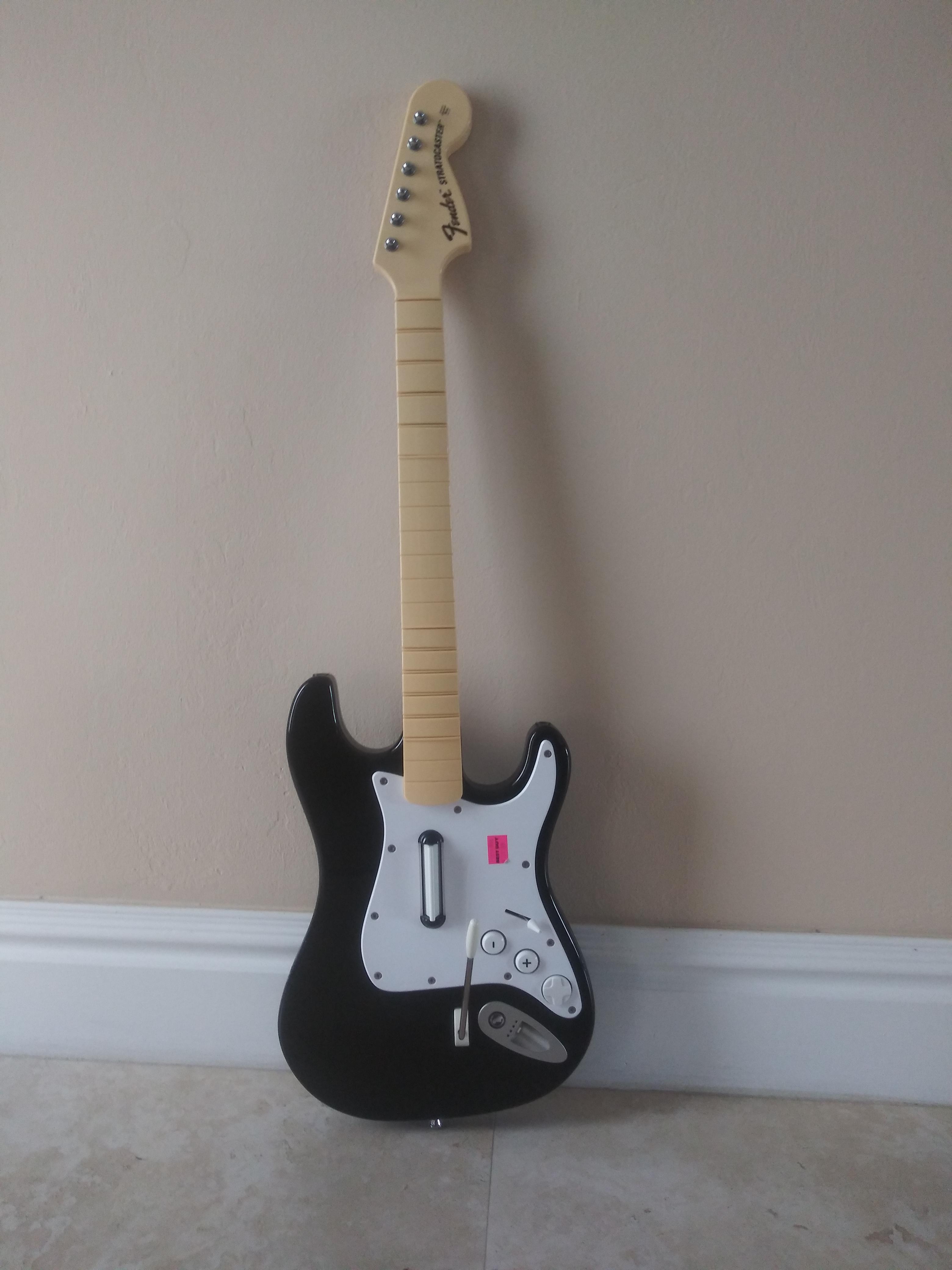 I got this rock band fender stratocaster guitar from a friend for free