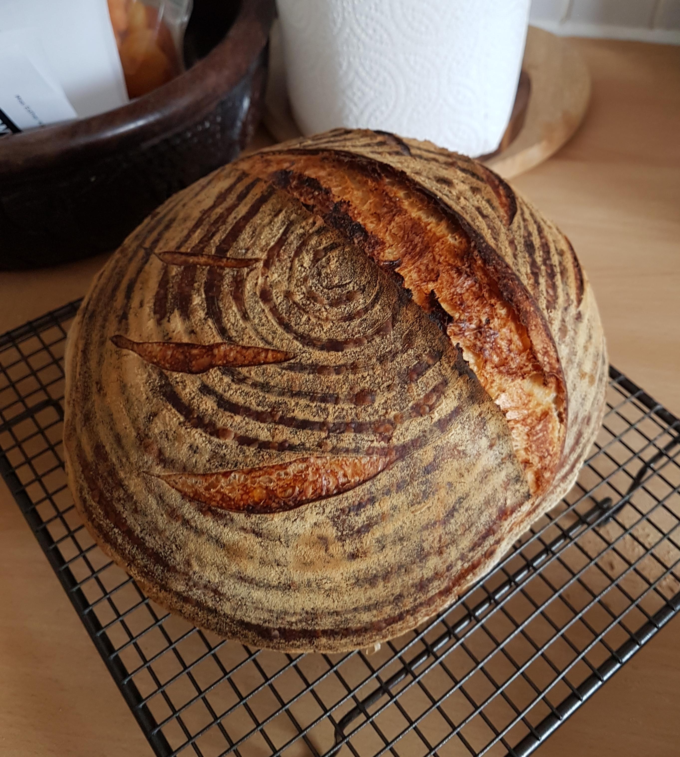 My first sourdough dutch oven boule! r/Breadit