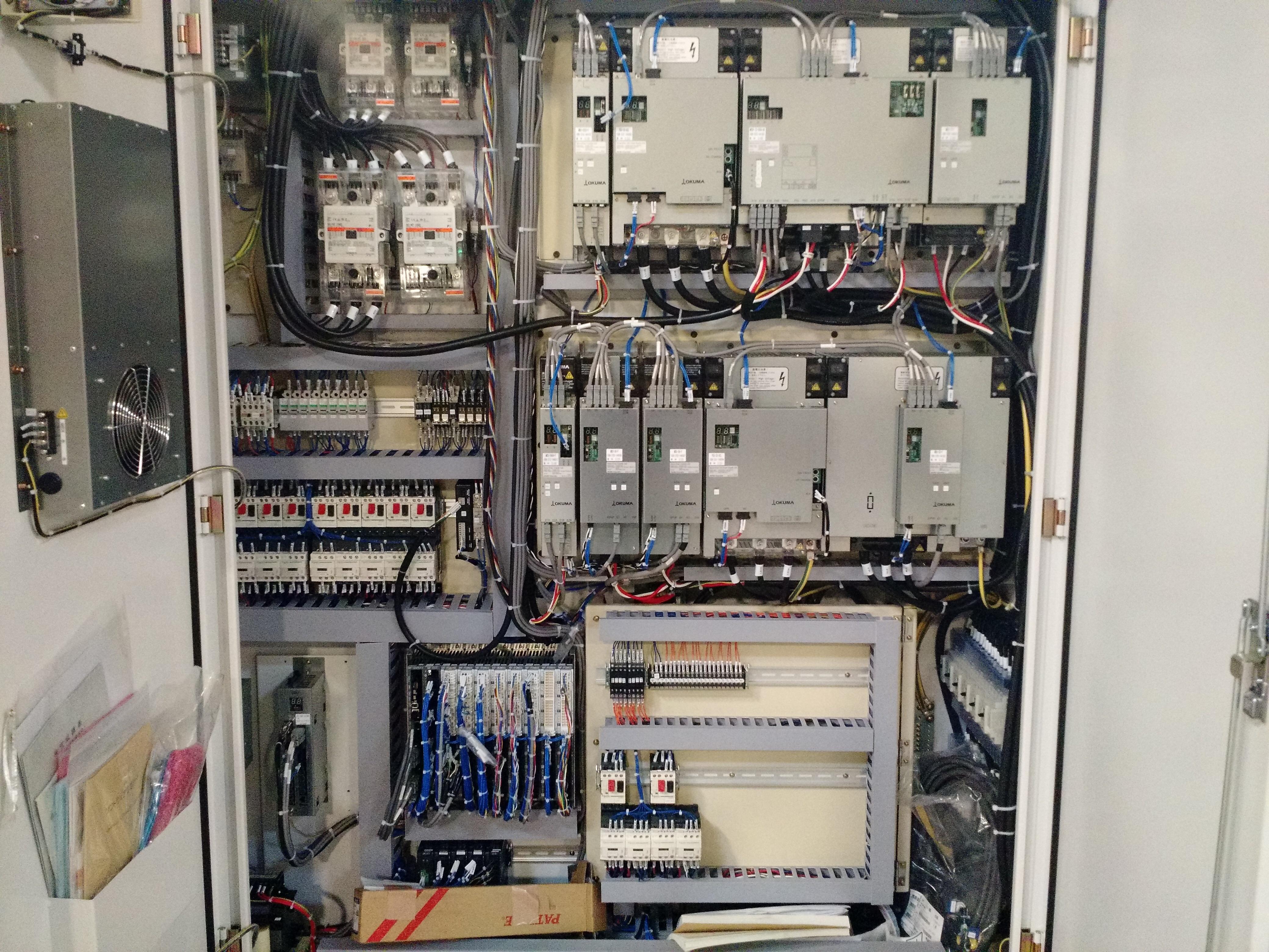 Guts of a CNC machine with 13 motion axes cableporn