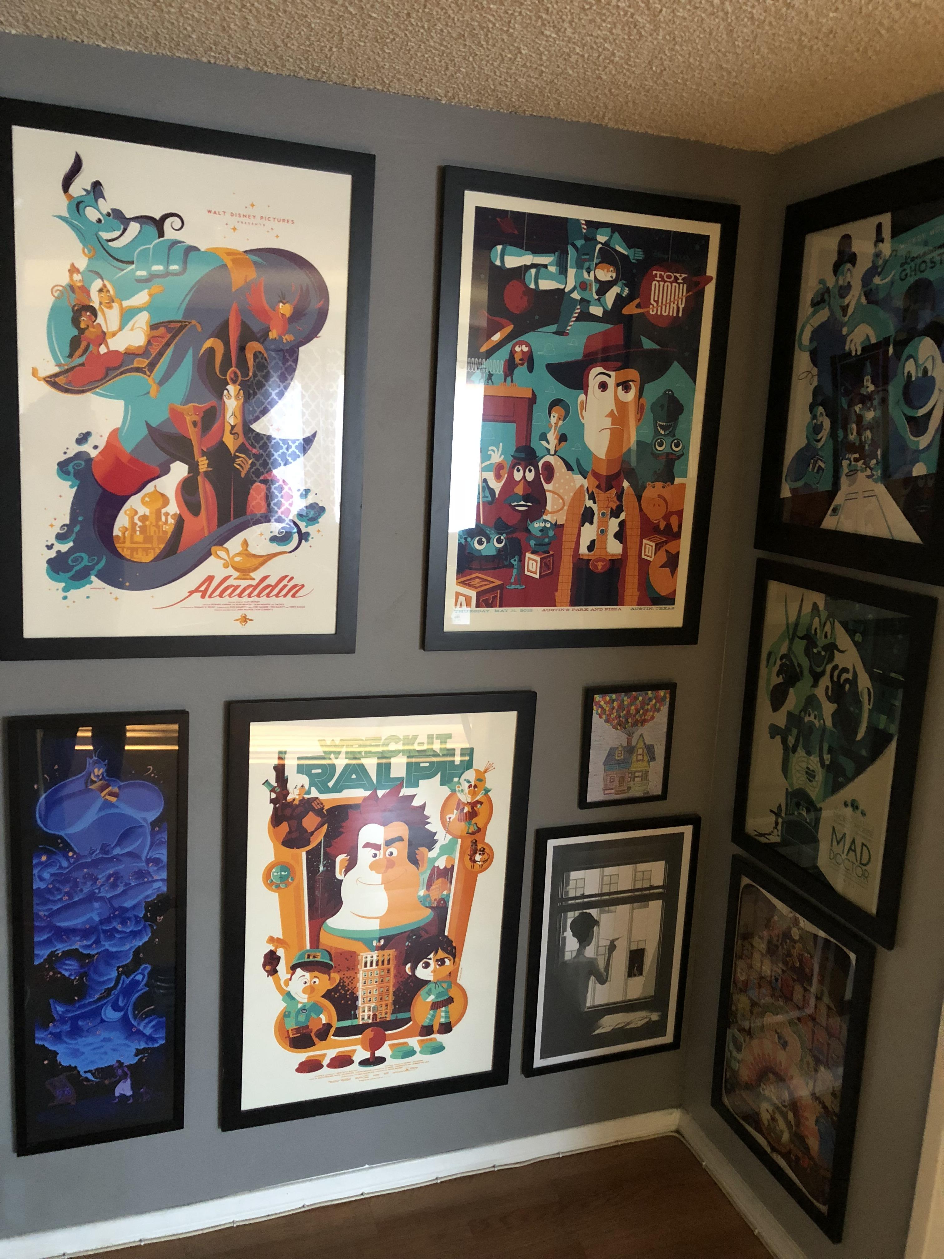 Wanted to share my Disney art collection r/disney