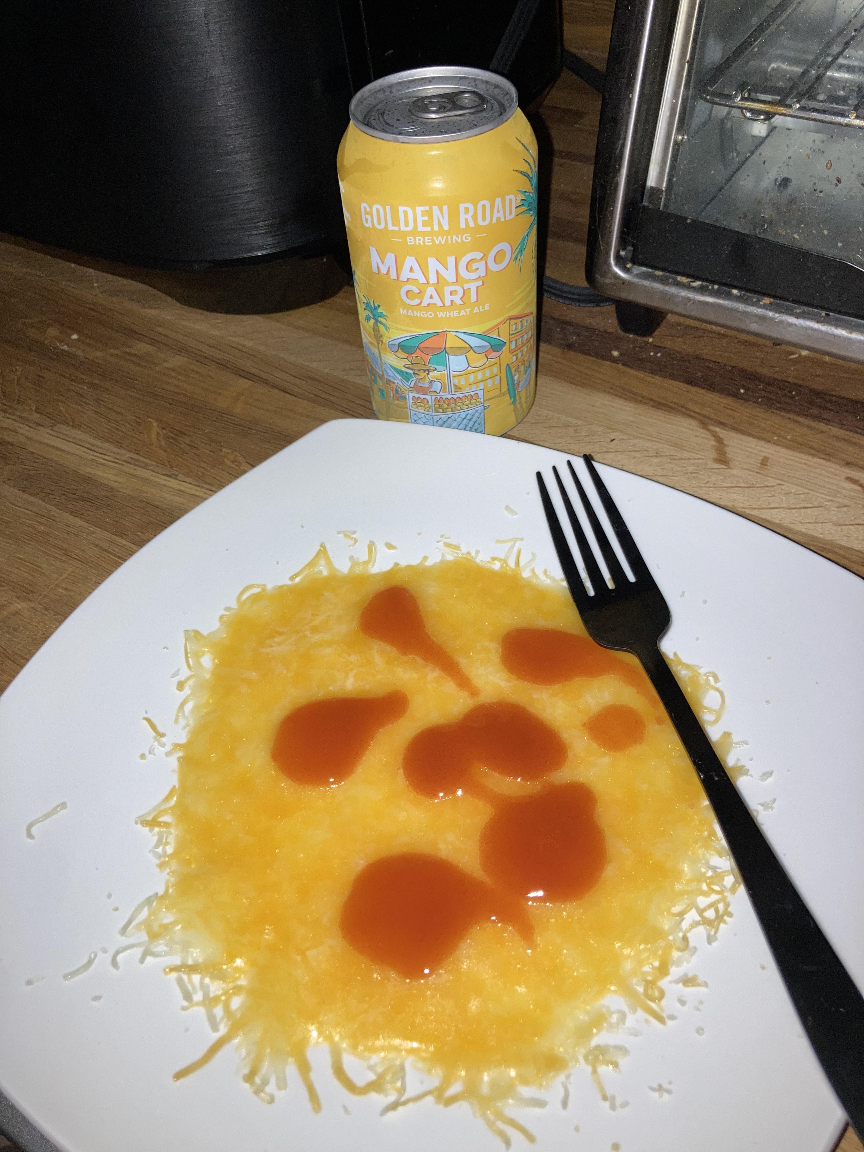 Plate of melted Colby jack cheese with chilled Frank’s red hot sauce. r/shittyfoodporn