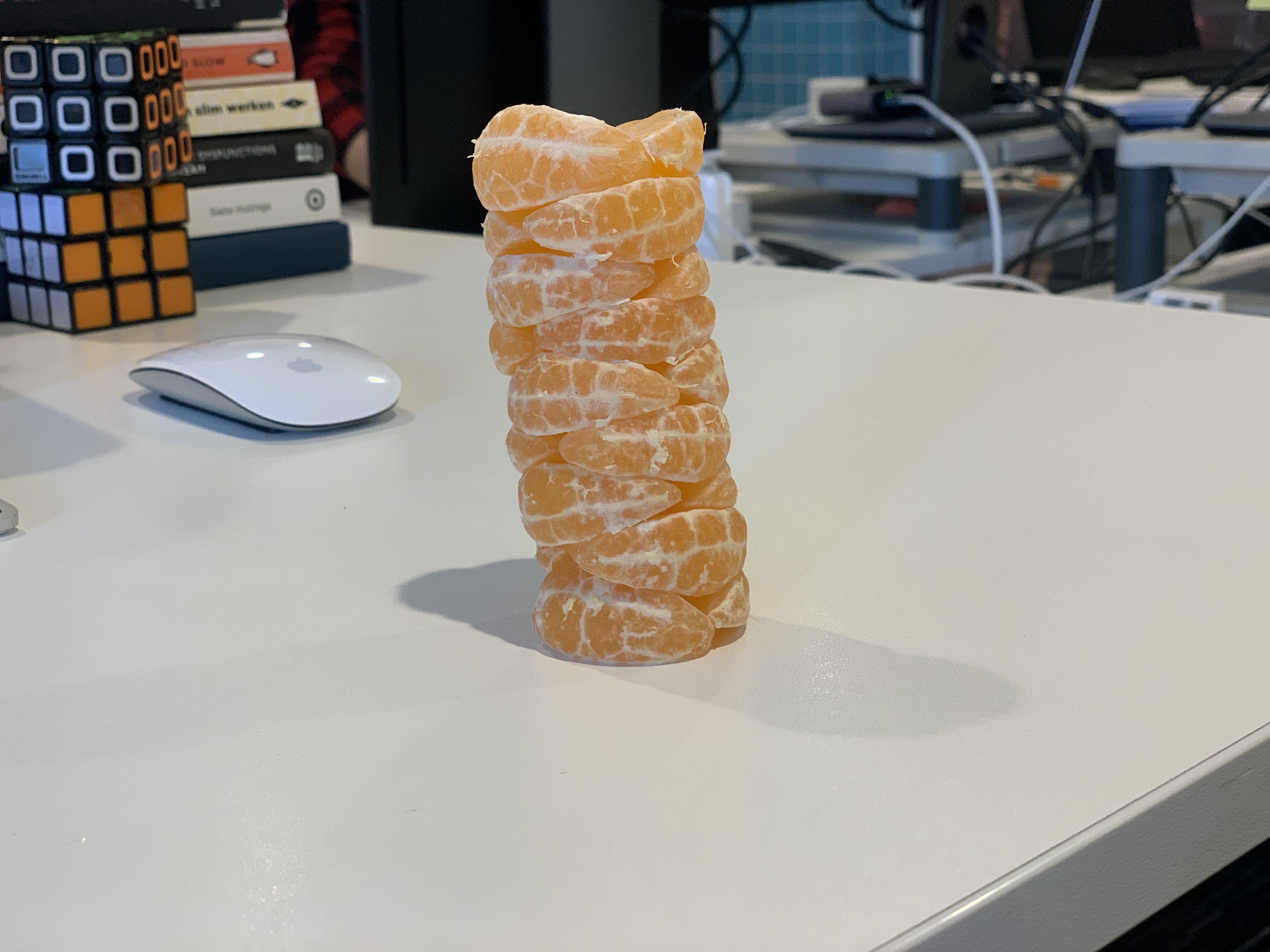 Built a tower out of mandarin parts r/mildlyinteresting