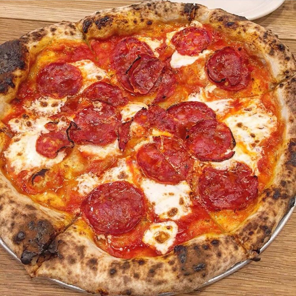 Pizza with Hot Calabrian Soppressata, Fresh Mozzarella & Local Honey