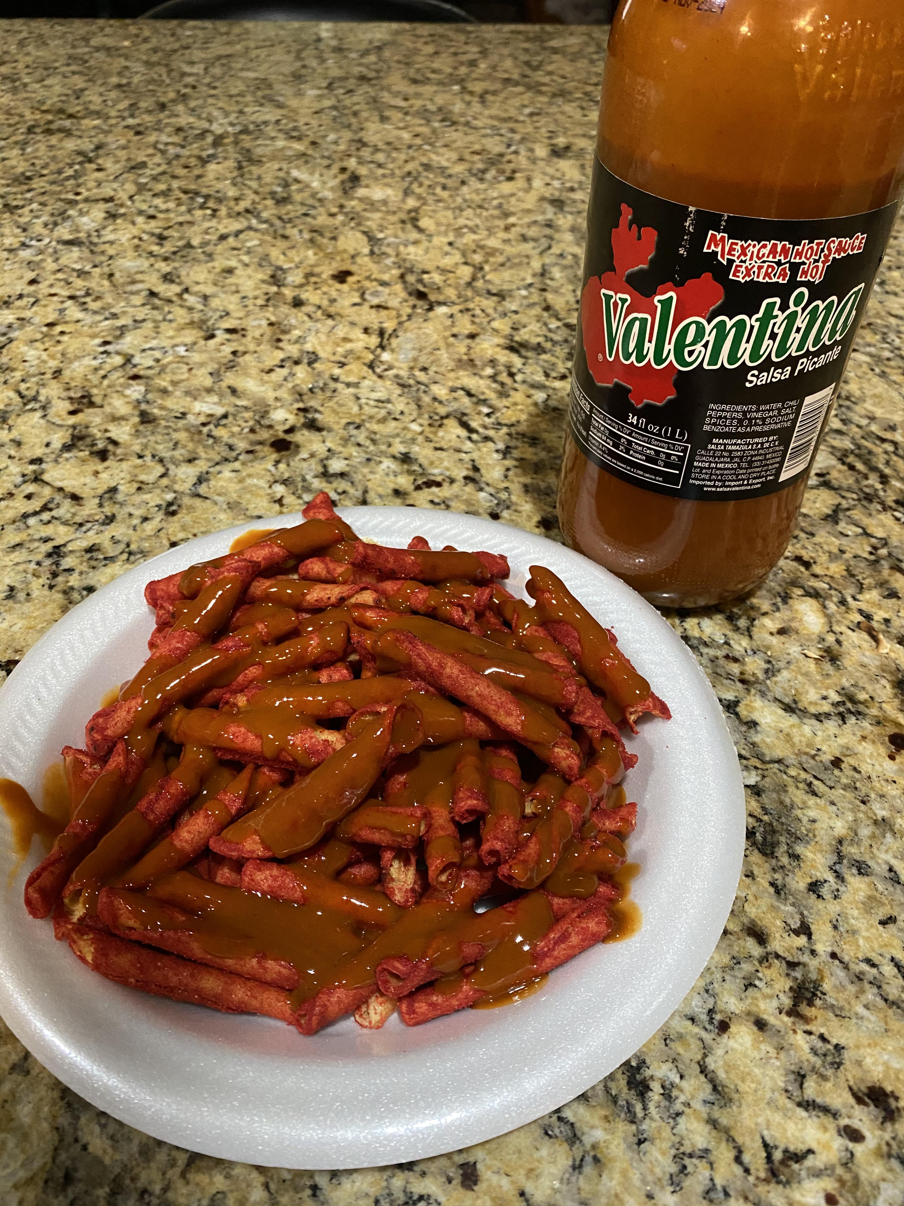 Takis with Valentina. One of my favorite things to snack on r/spicy