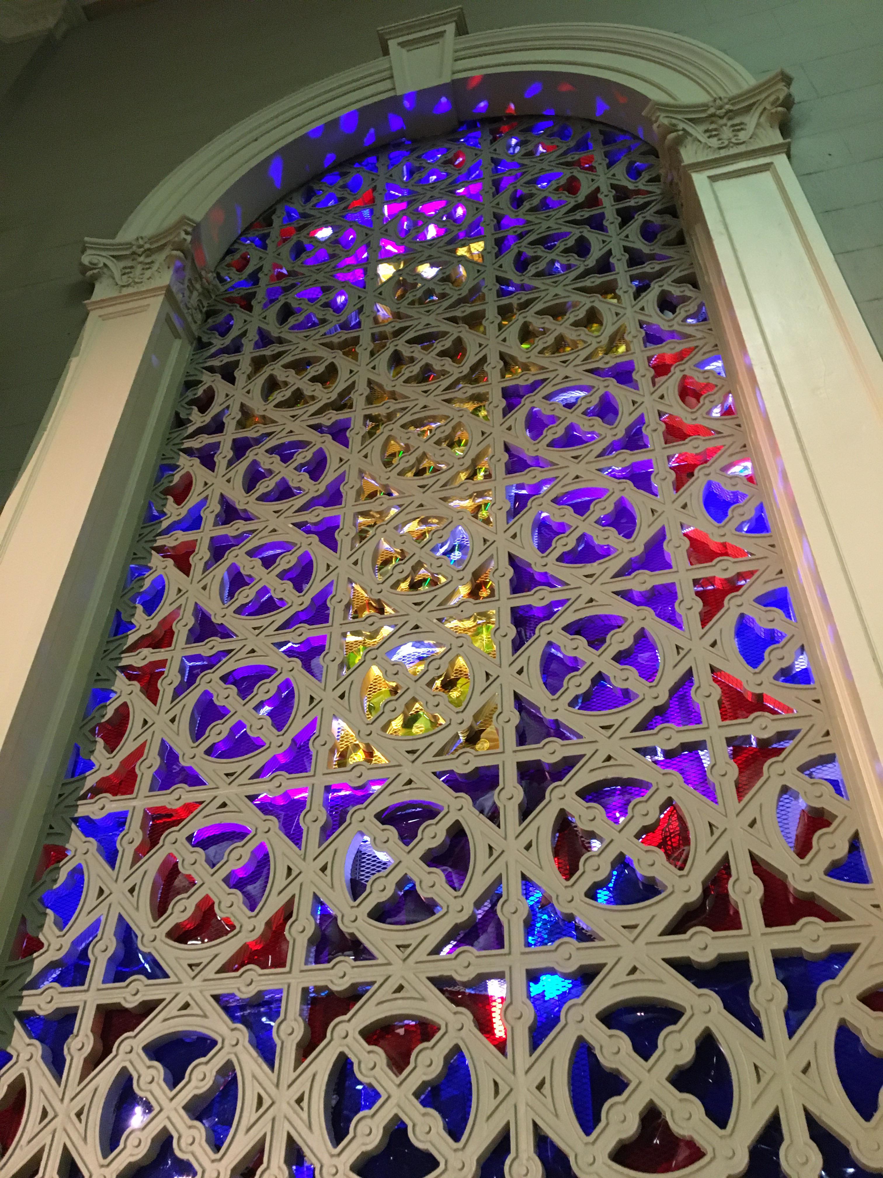 my magnum opus stained glass made of gels and old cds for my school’s