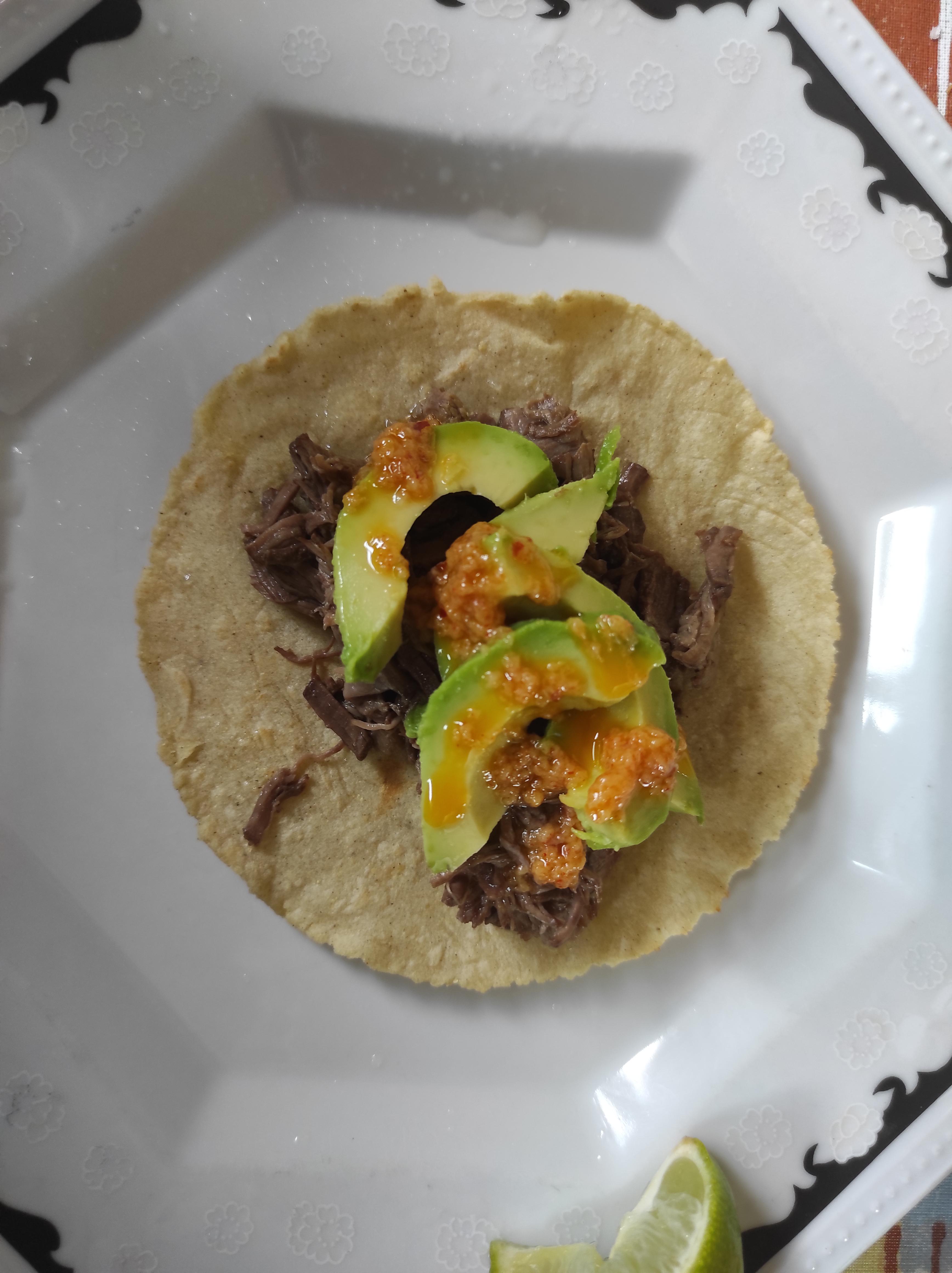 Homemade barbacoa tacos on my first ever proper homemade tortilla, the