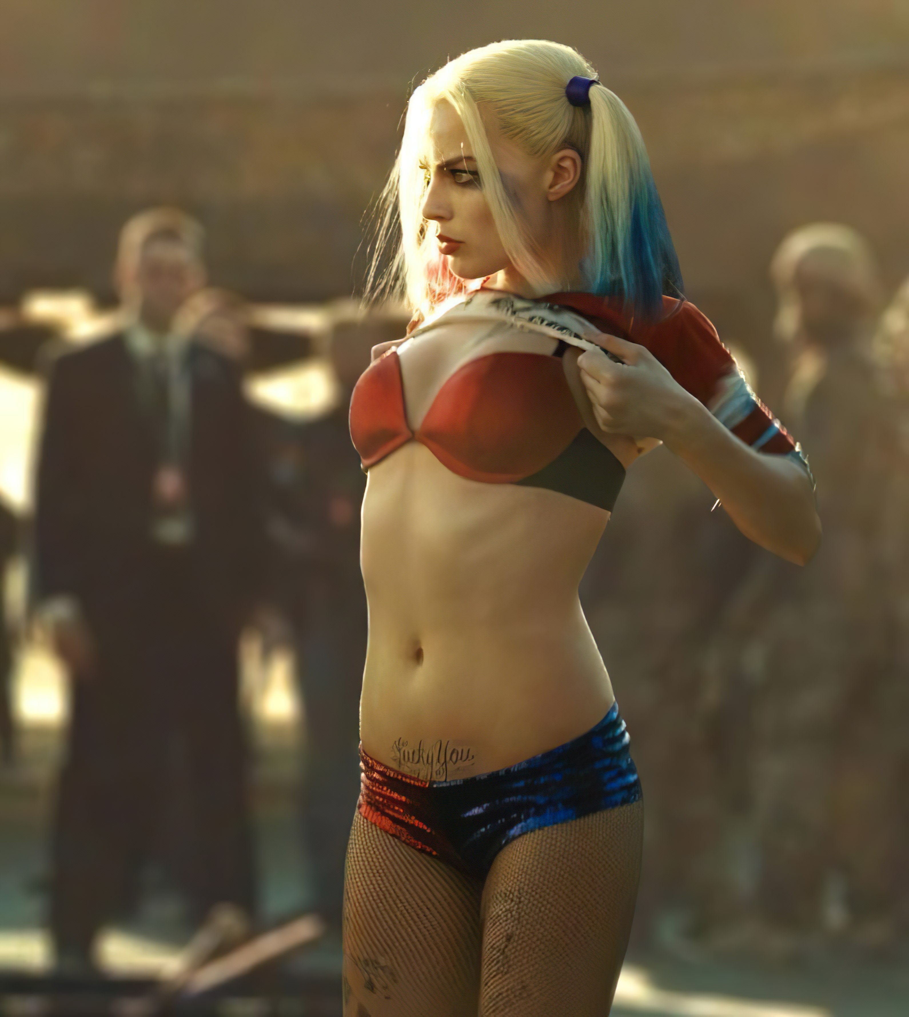 As Harley Quinn : MargotRobbie