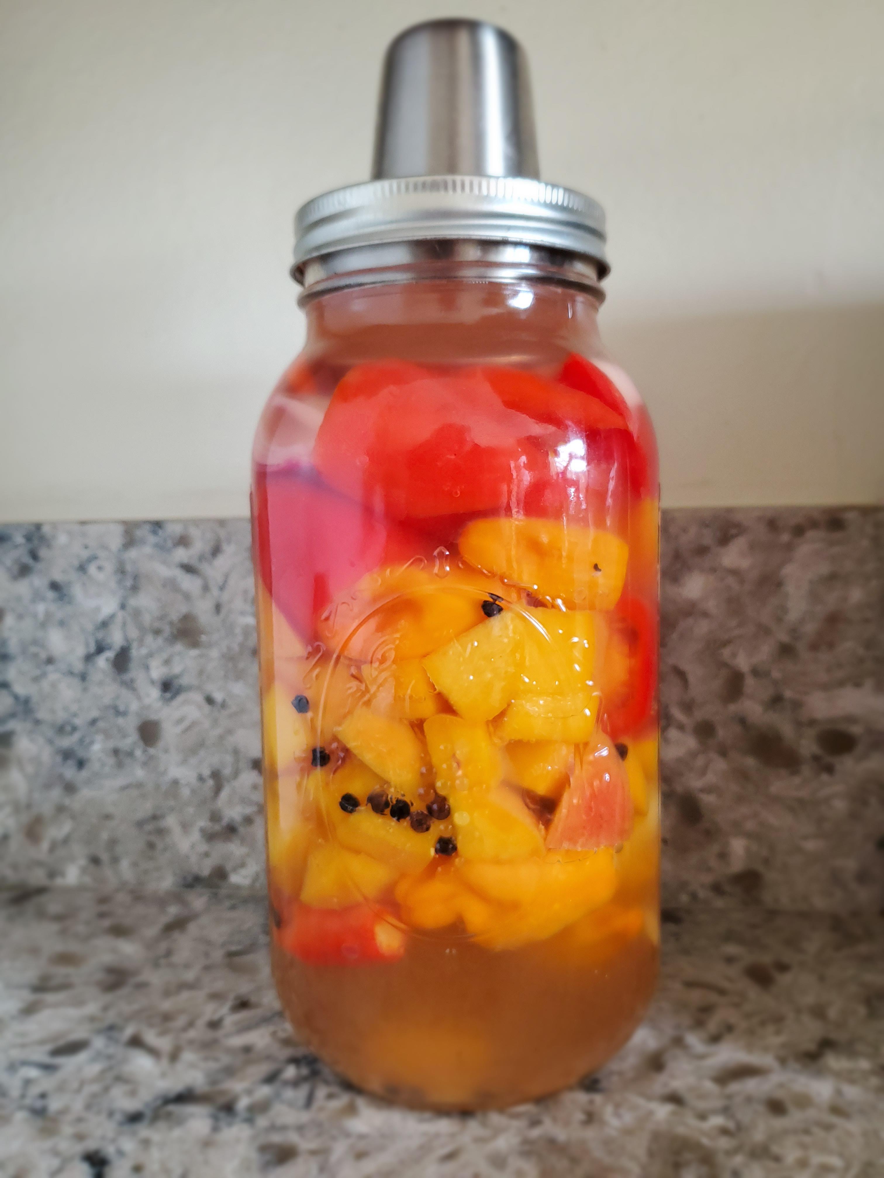 Lacto fermenting habanero, paper lantern, bell pepper, peach, spring