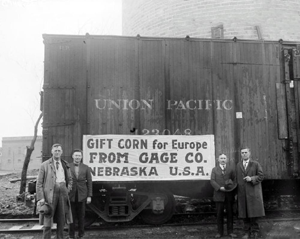 Gift of corn, sent by farmers to war torn Europe. The boxcar doors are