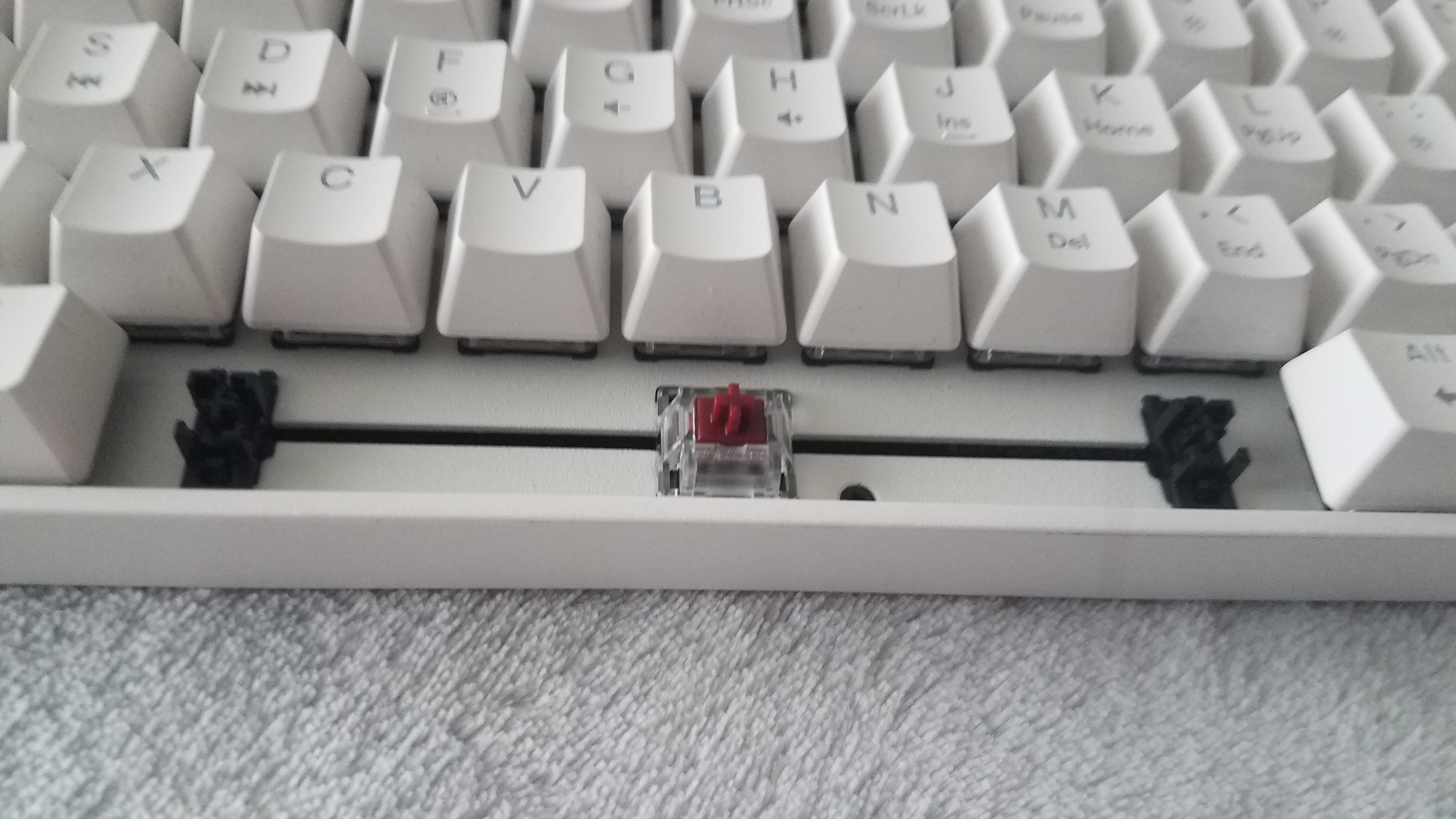 Someone told me to look under the spacebar and see if it says it's a