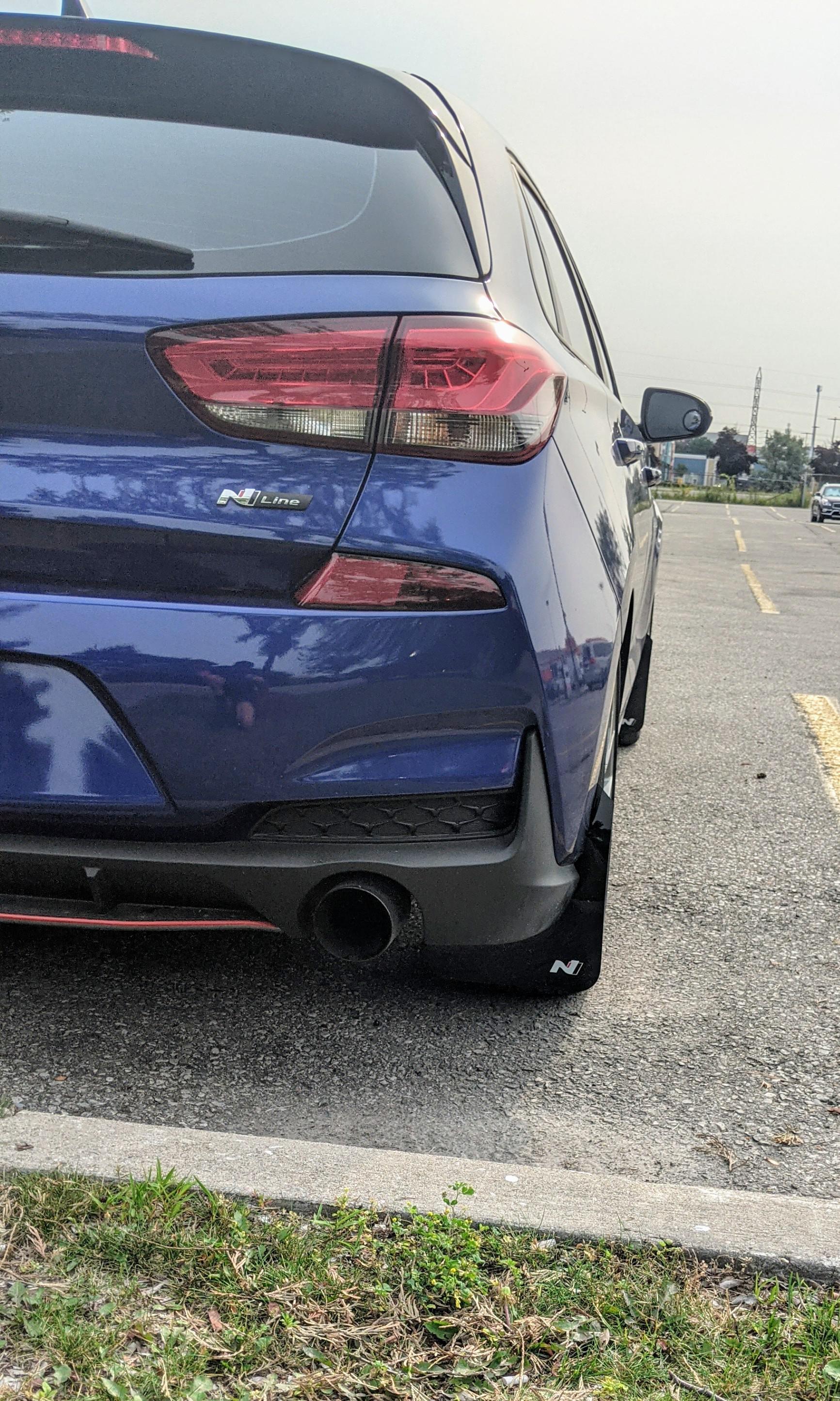 Added some mud flaps, cleaning tar off the rocker panels sucks. Simple