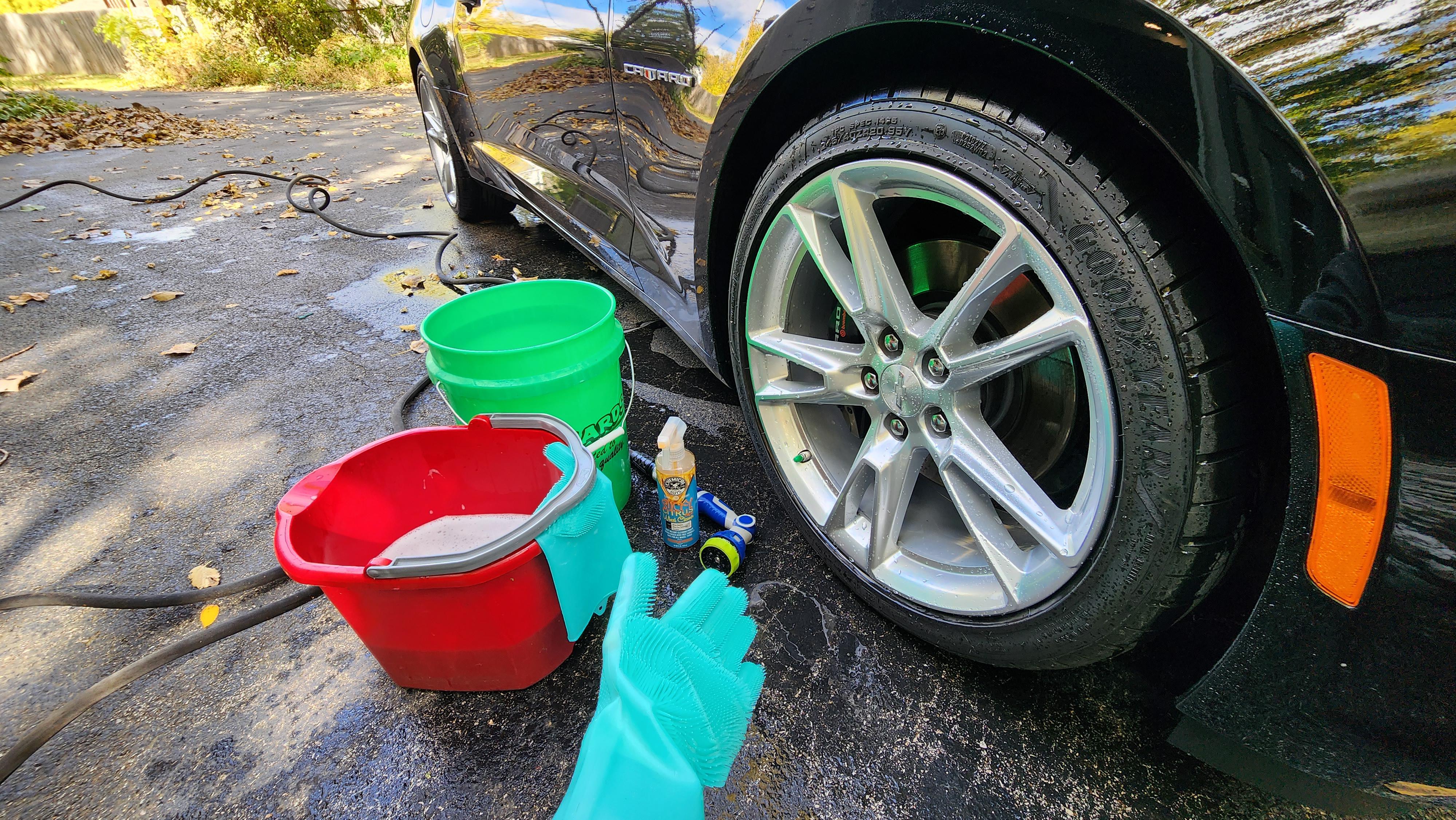 Dishwashing gloves work pretty well for getting inside the wheels, the