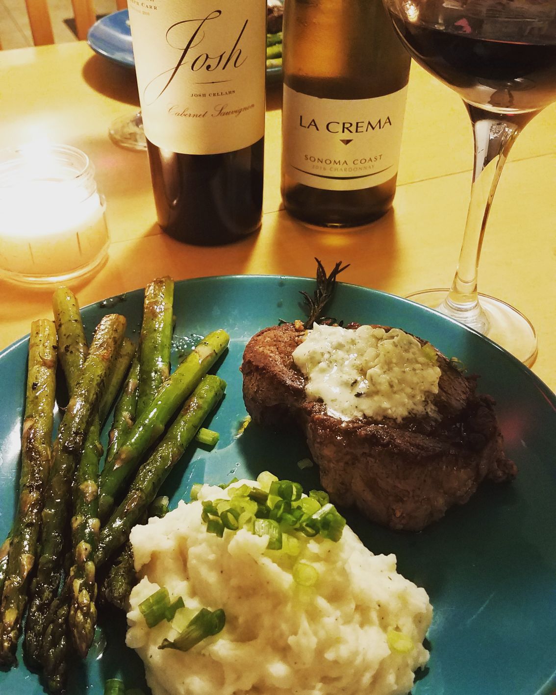Filet mignon with blue cheese butter, garlic mashed potatoes, and