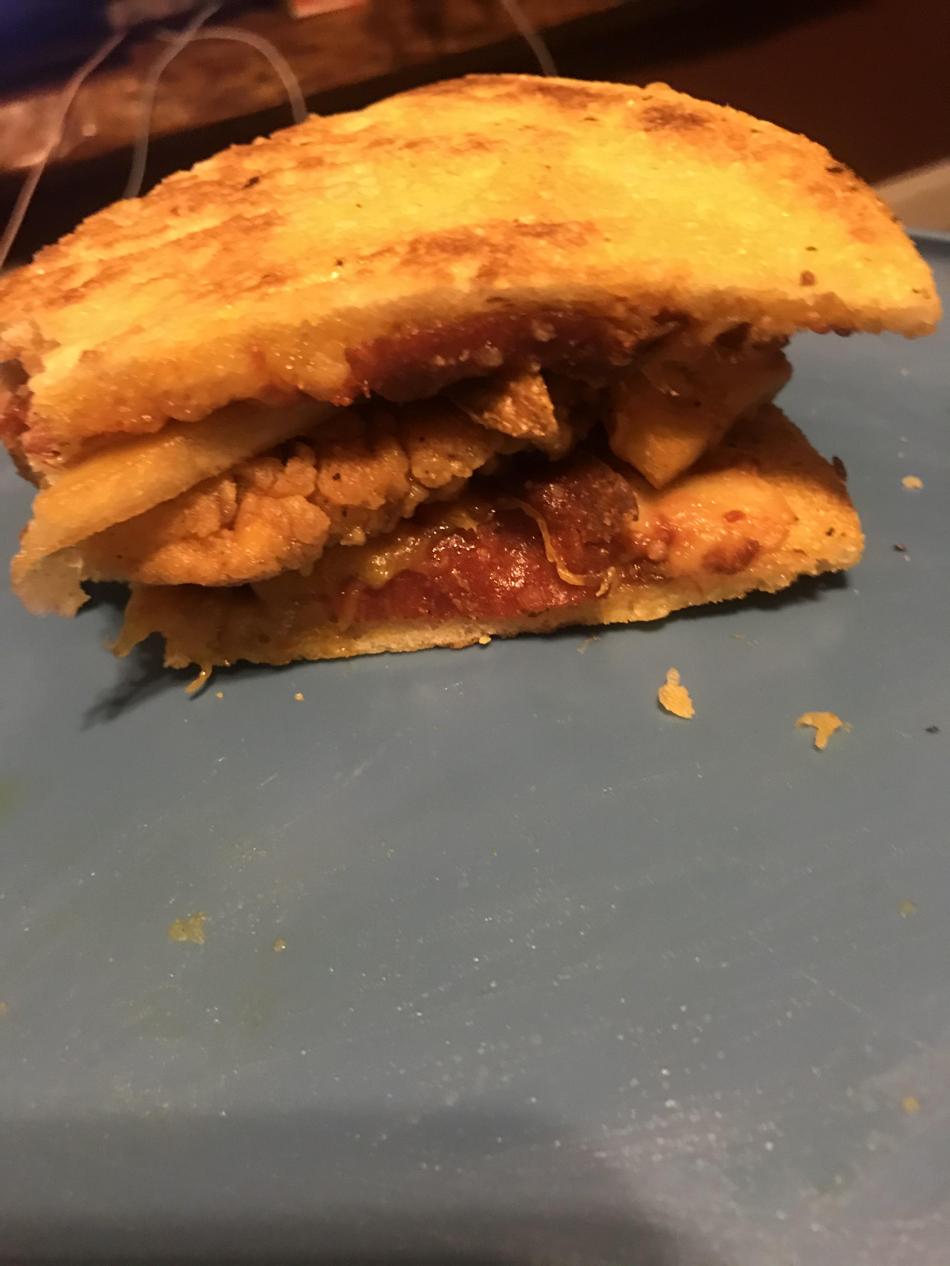 The Sandwich Two slices of hungry howies pepperoni pizza, a bojangles