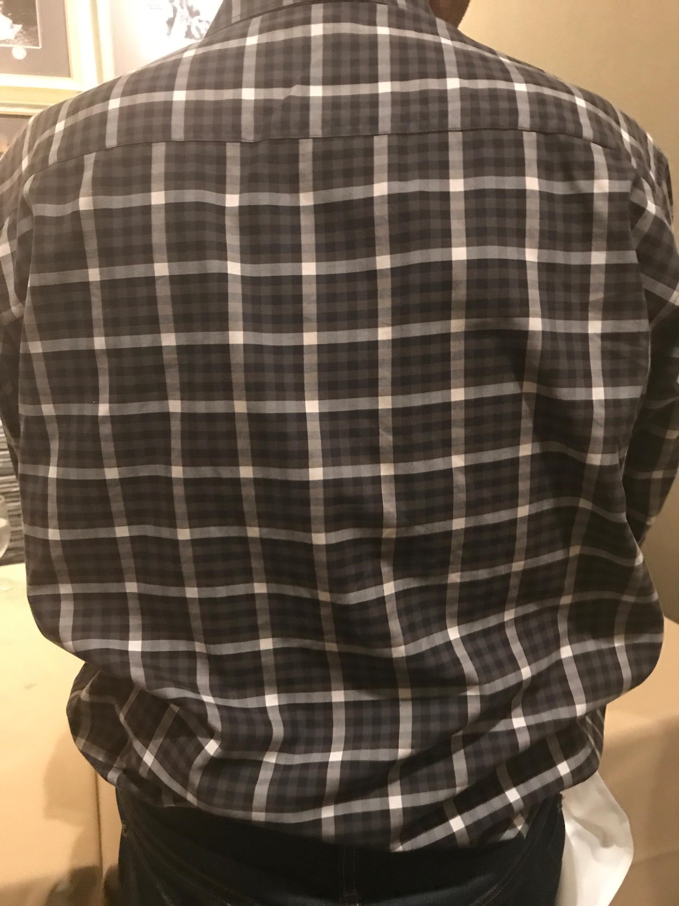 Can you spot the black dots on my dad's shirt? r/mildlyinteresting