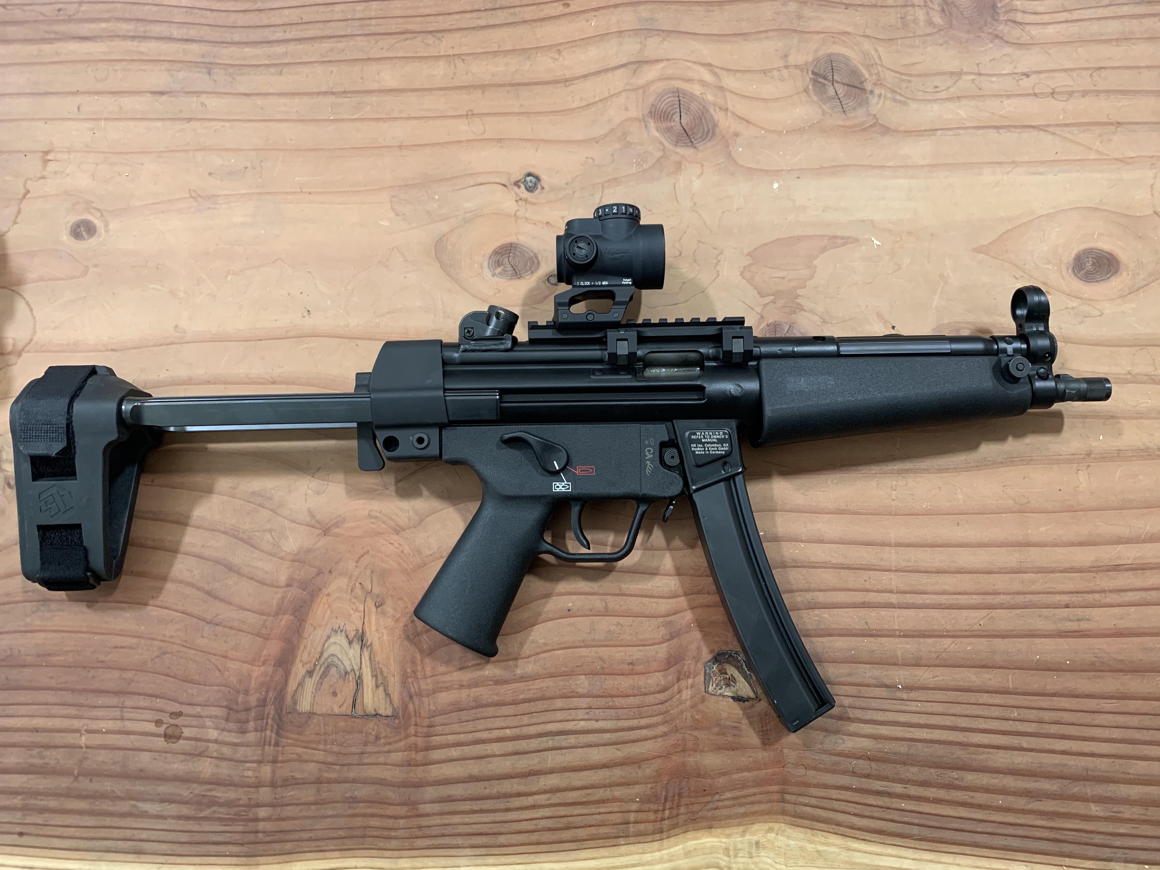 HK sp5 with some extra goodies guns