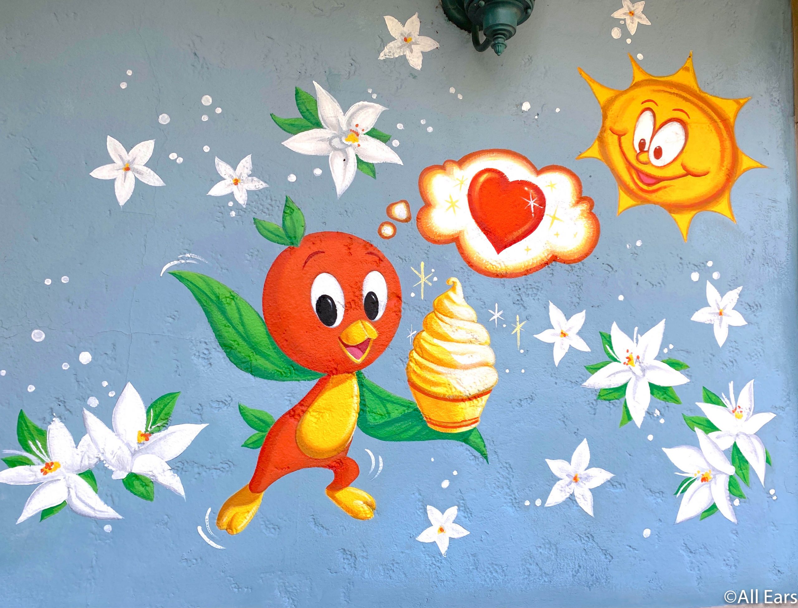 A New Orange Bird Mural has Been Revealed at Sunshine Tree Terrace in
