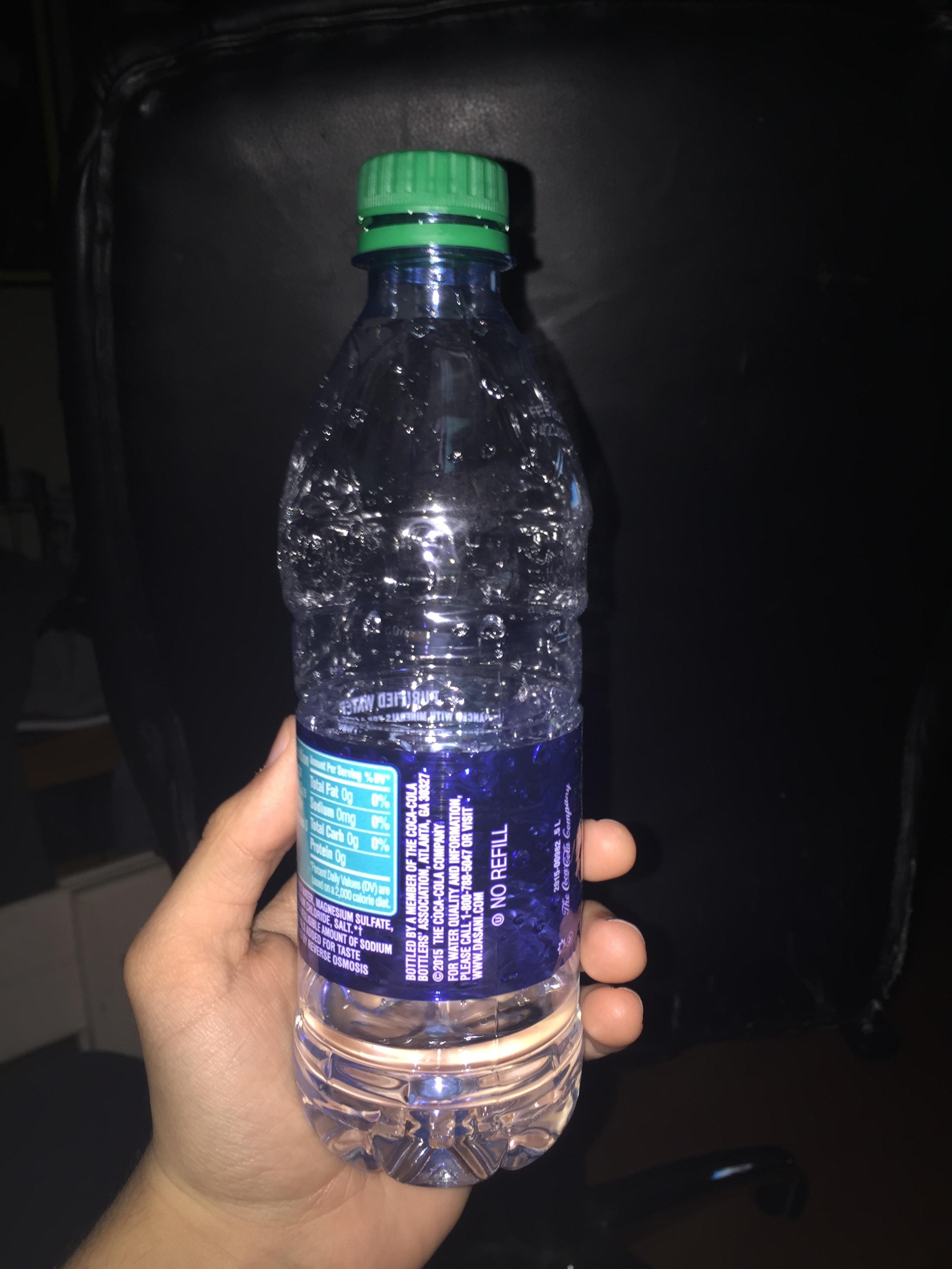 Here's a water bottle that is almost empty, but not quite. r