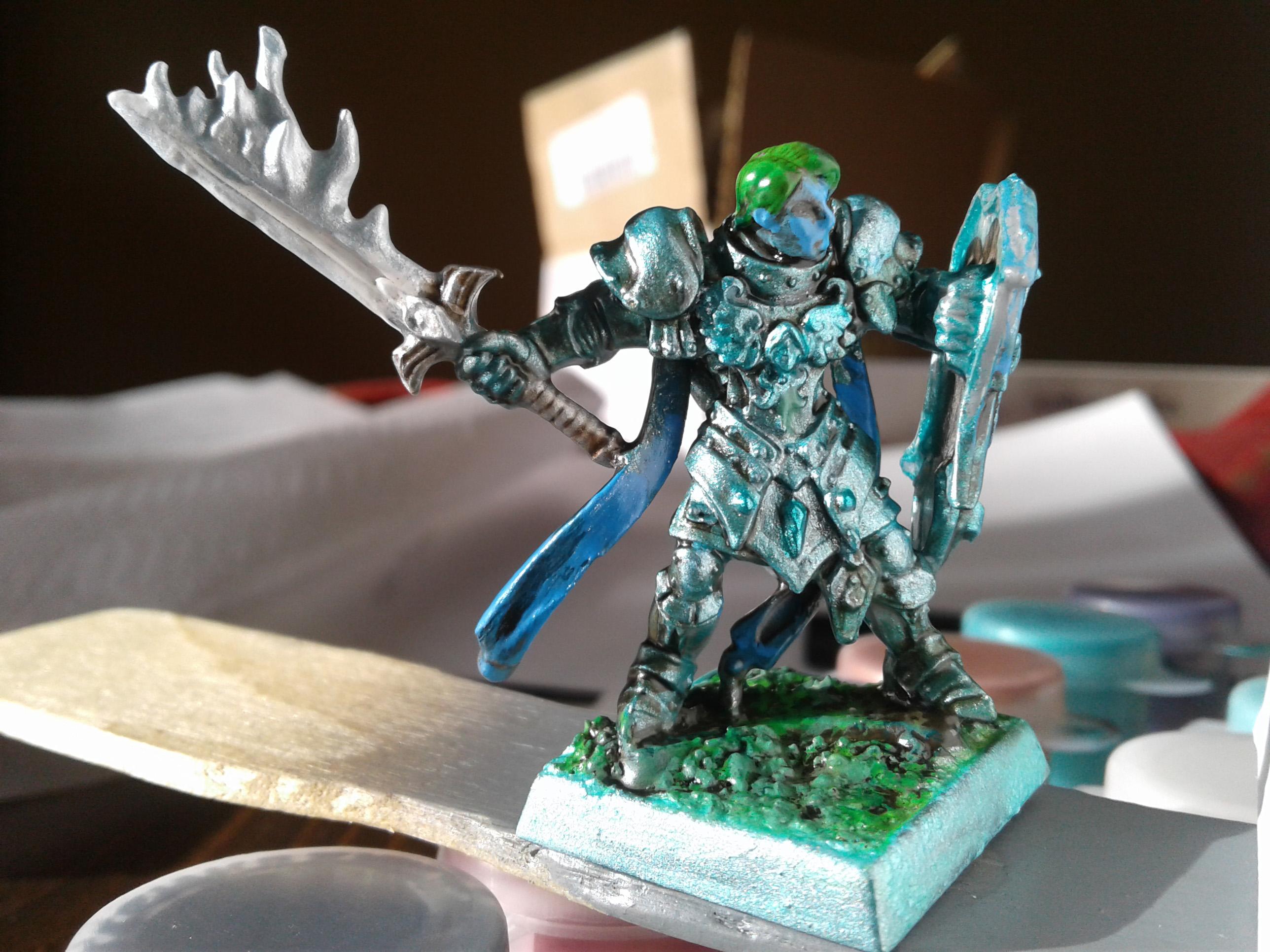 Painted my first ever mini last night a Triton paladin with a holy