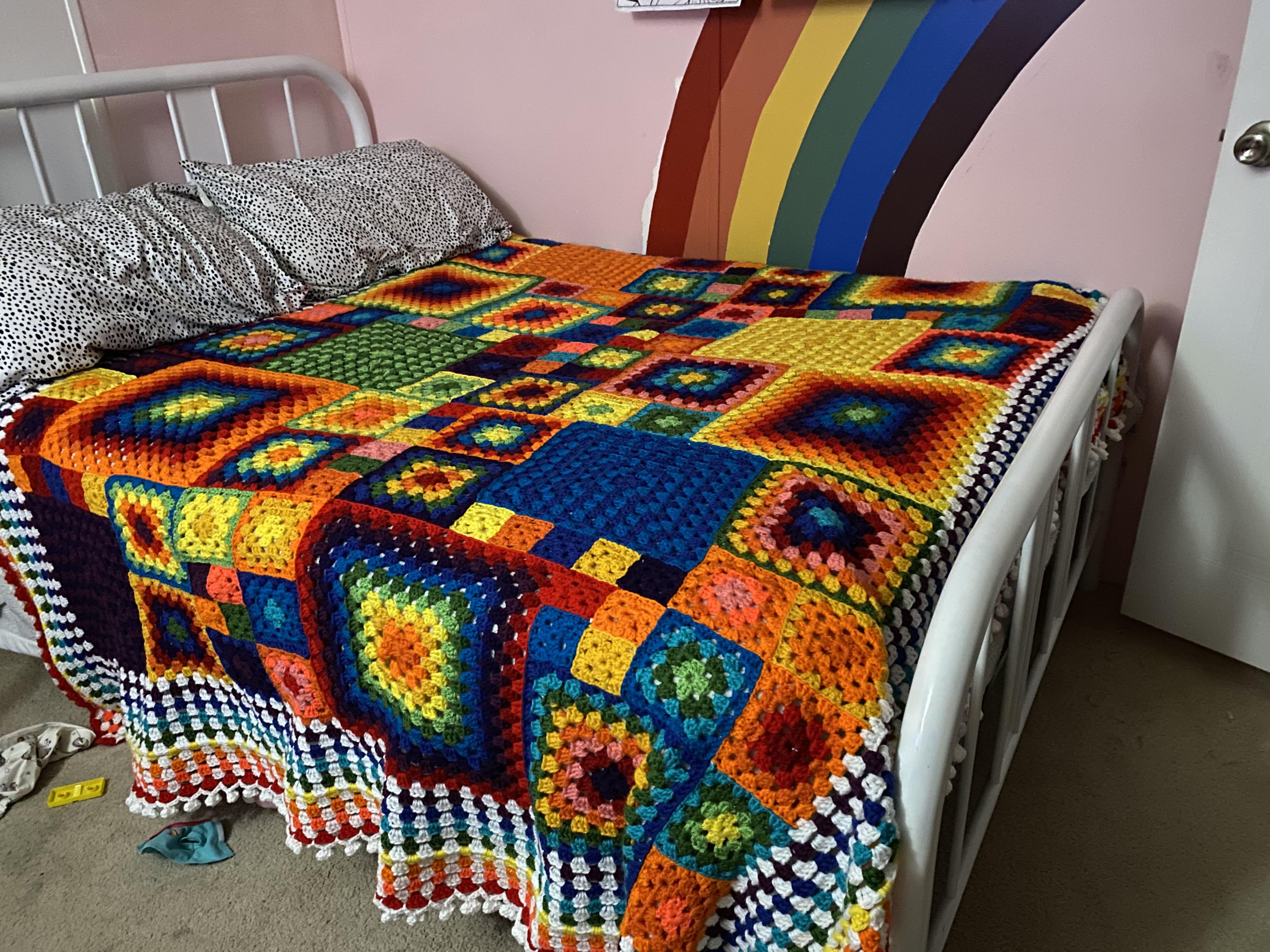 Took 9 months to finish this rainbow granny square blanket for my