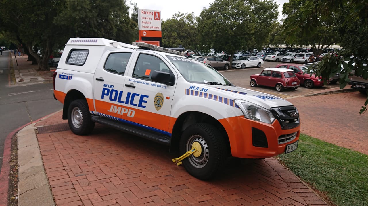 University of Johannesburg Security on a Metro Police Bakkie r