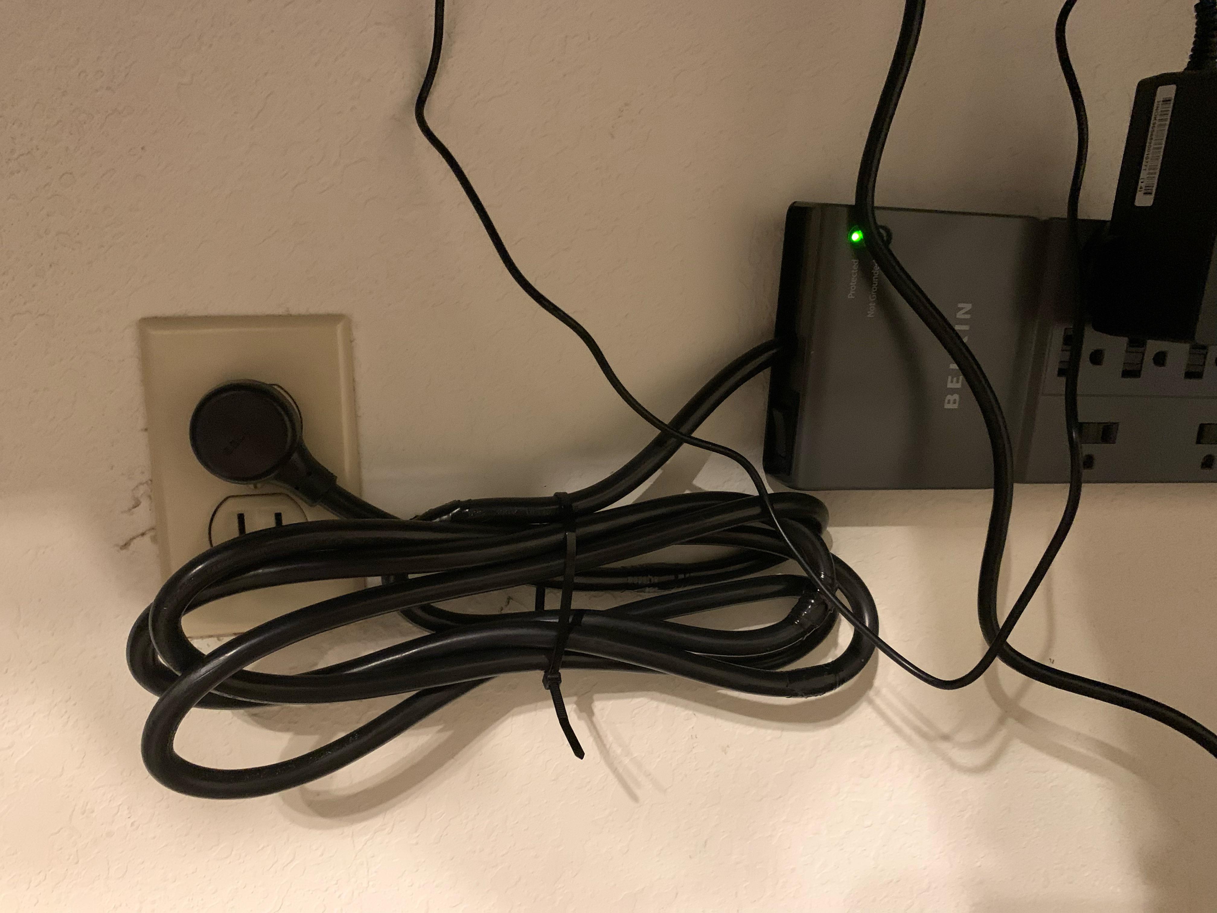 Is my surge protector cord dangling too much here? It’s kind of holding